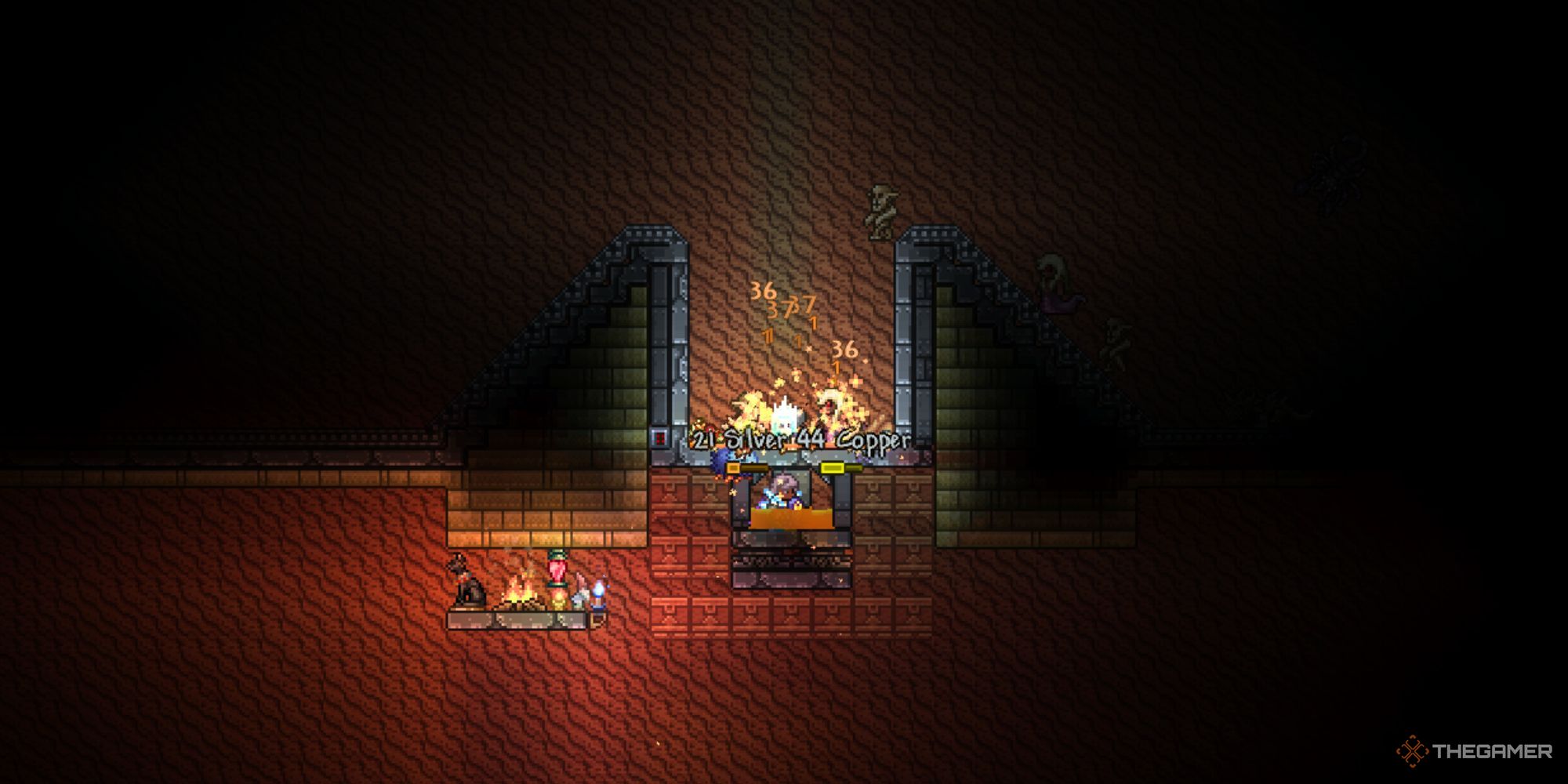 A player sitting underneath an AFK monster farm in the underground desert biome.