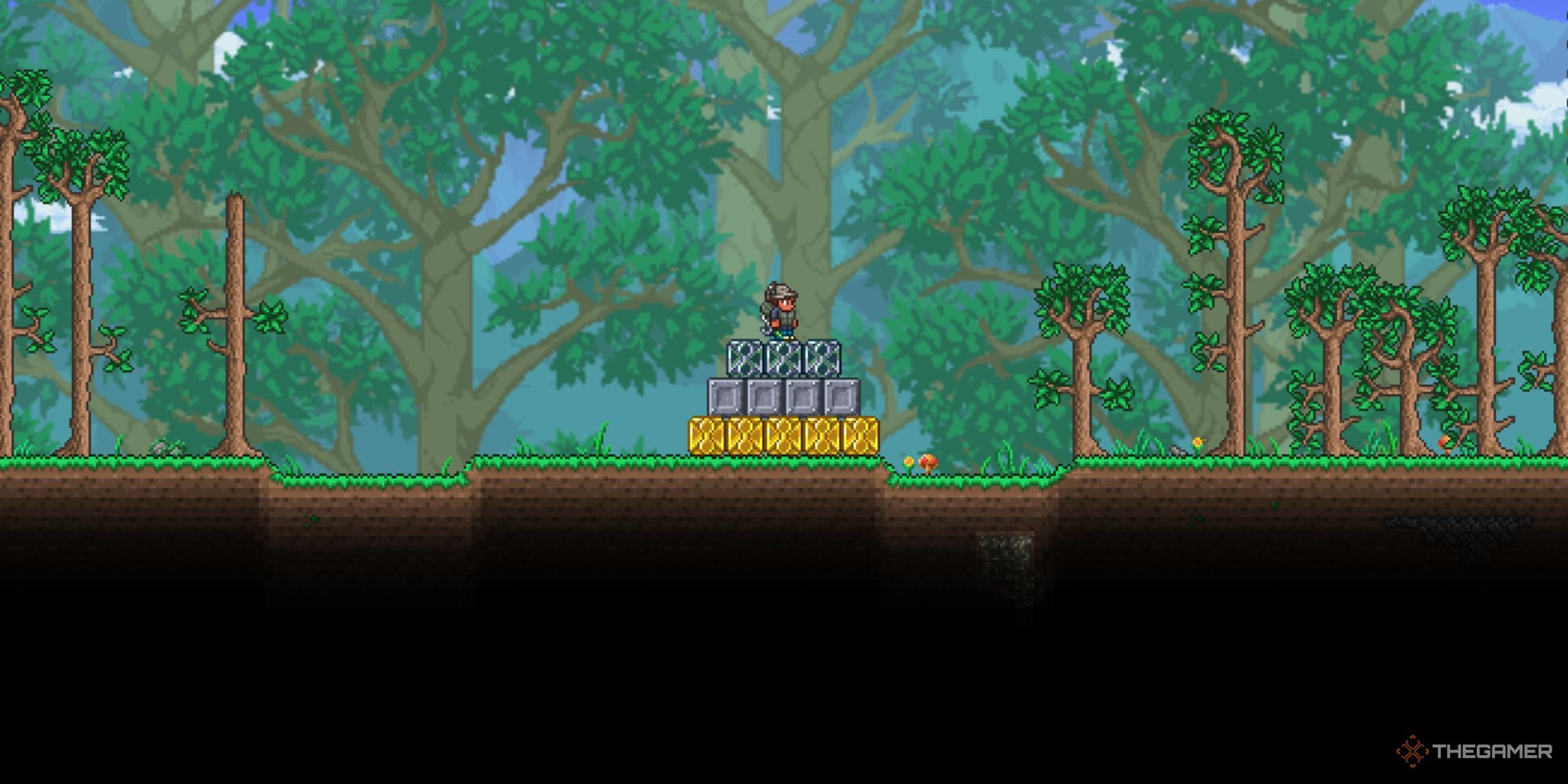 A player in a forest biome standing on top of a pyramid of gold, iron, and titanium fishing crates.