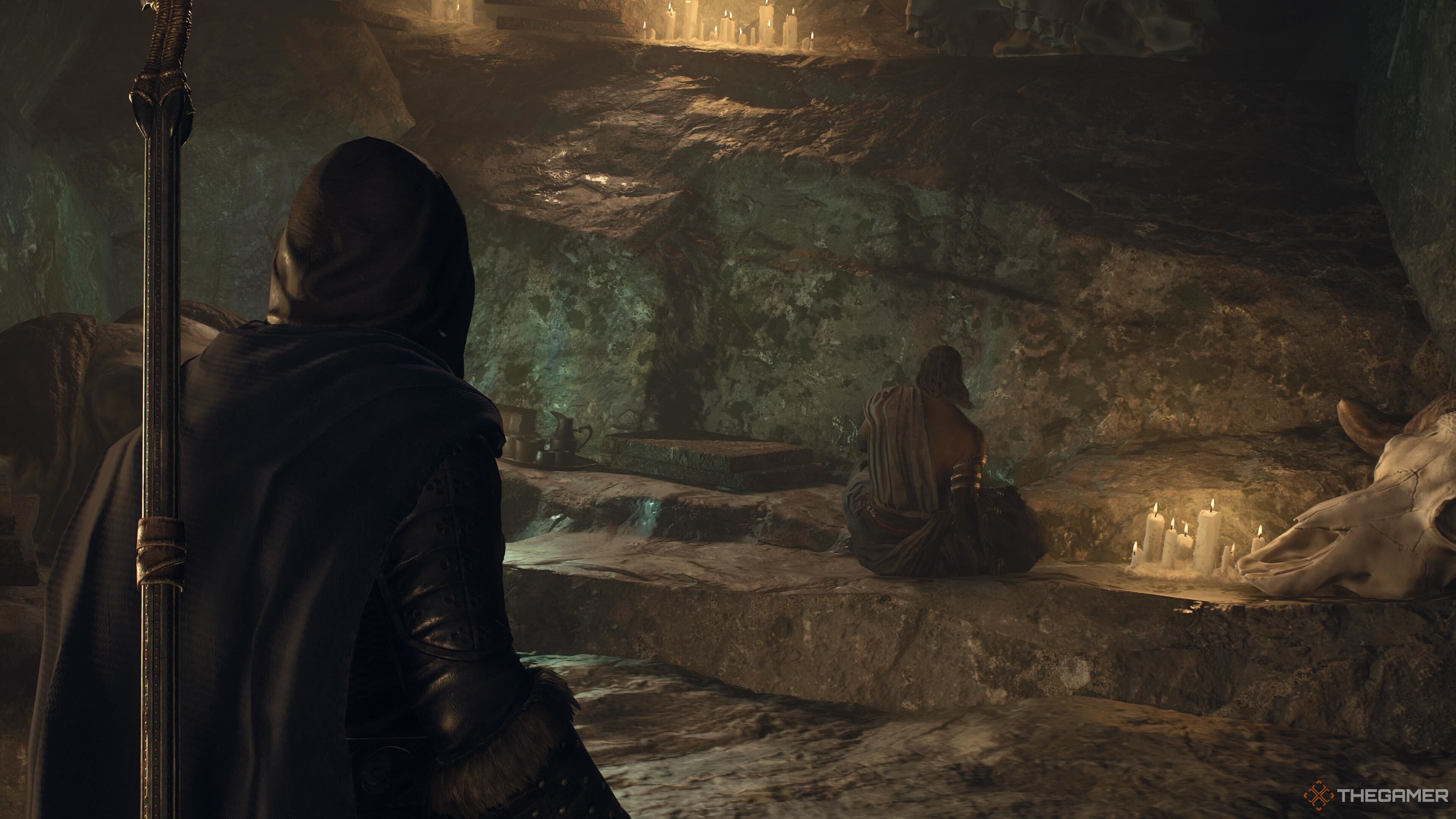 A screenshot from Dragon's Dogma 2 showing the player character standing a short distance away from the Dragonforged, who has their back turned to the player.
