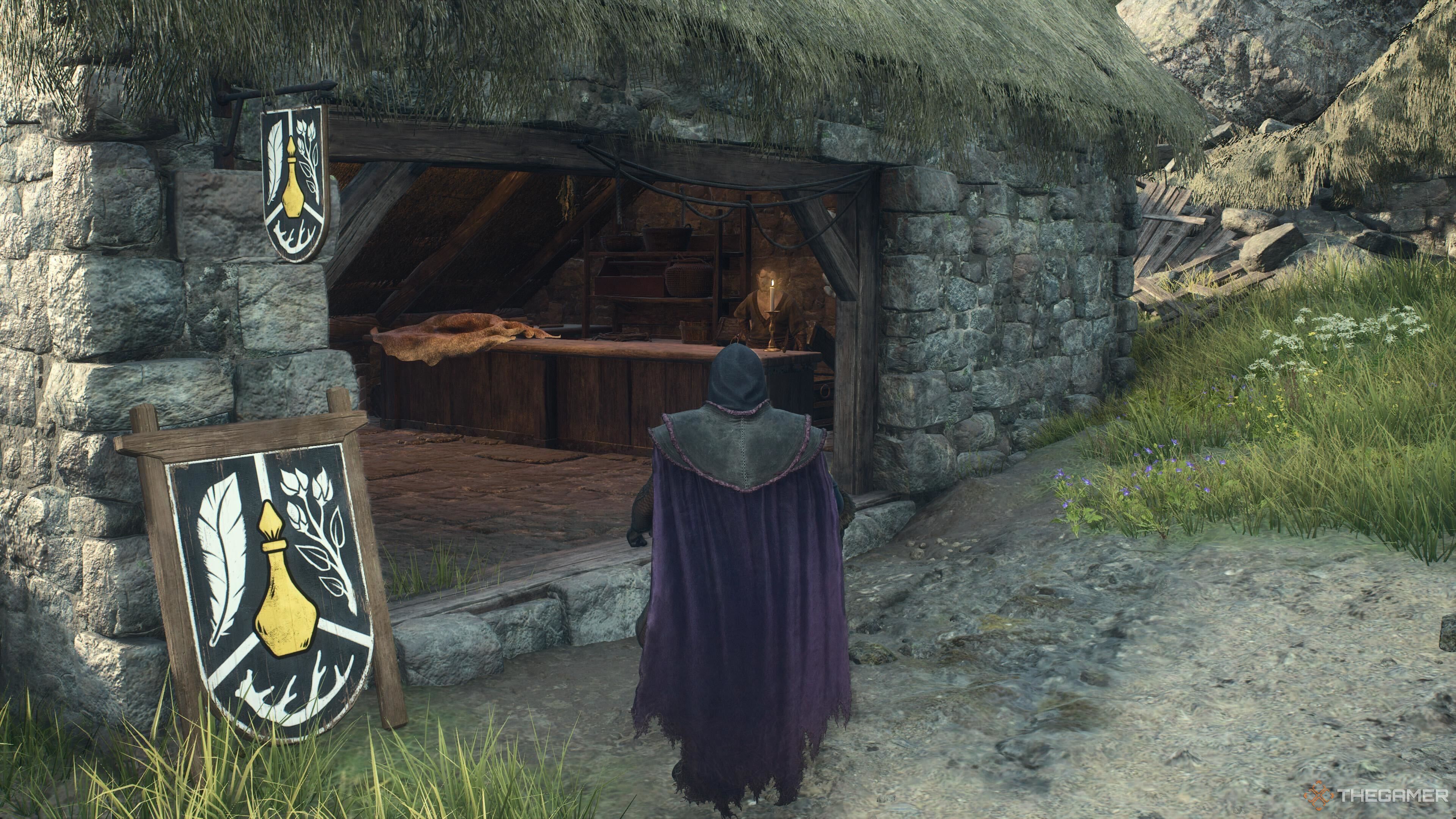 A screenshot from Dragon's Dogma 2 showing the player character standing outside of the shop in Harve Village after it has been freed.