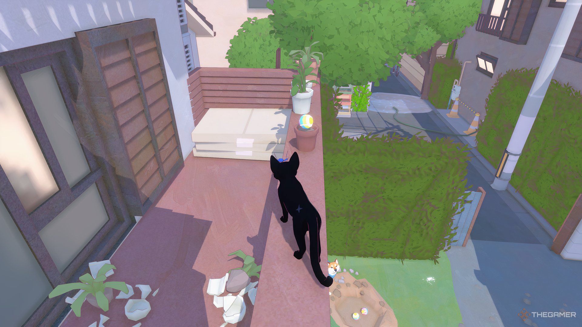 Finding the rainbow ball in the flower pot on the balcony railing in Little Kitty, Big City.