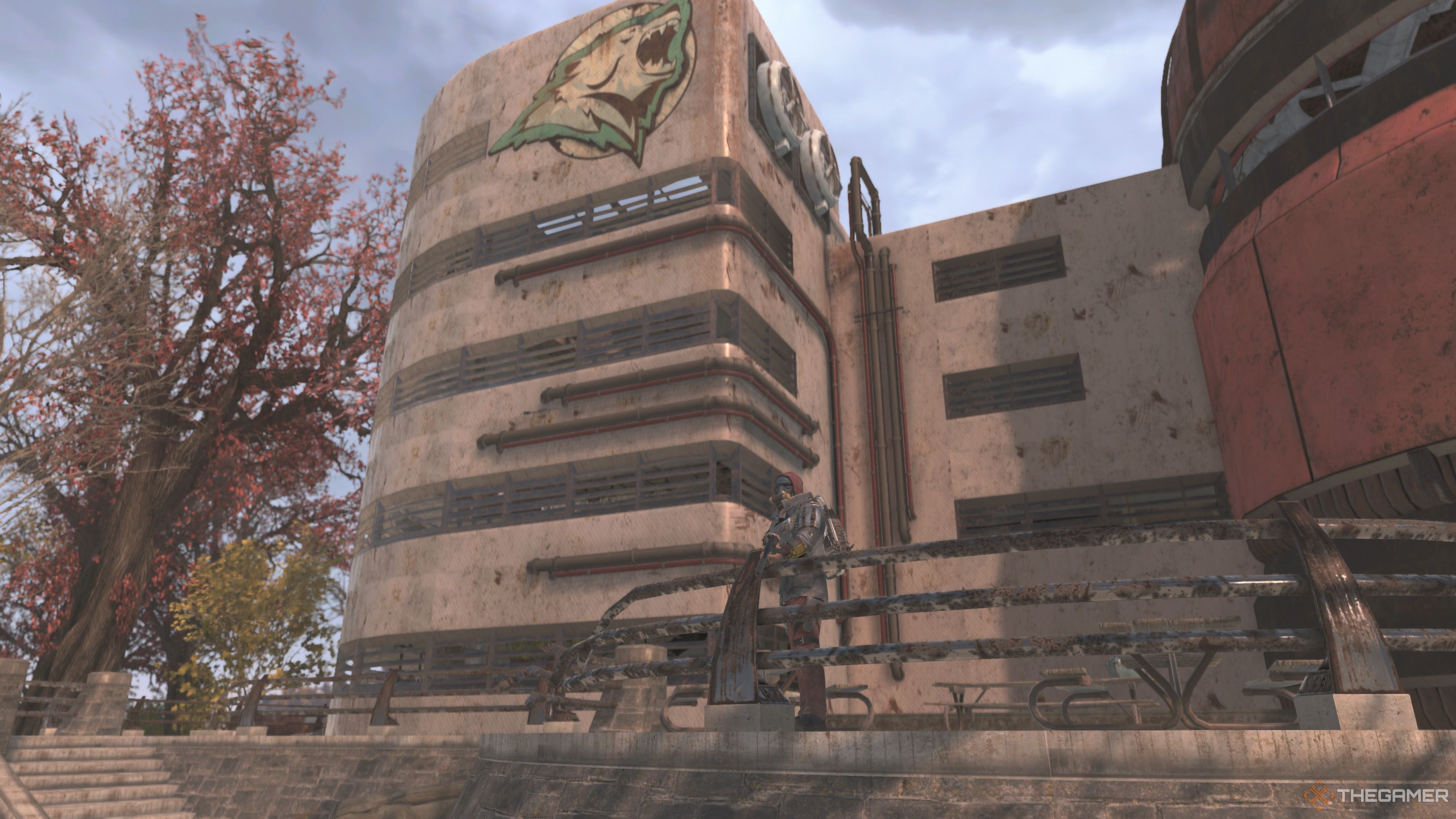 The Vault Dweller stands outside Arktos Pharma in Fallout 76.