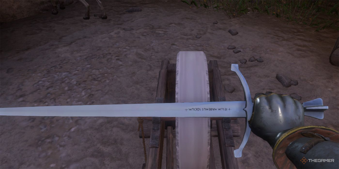 The Stinger at a sharpening station. The weapon has upturned cross guards and a Latin inscription.