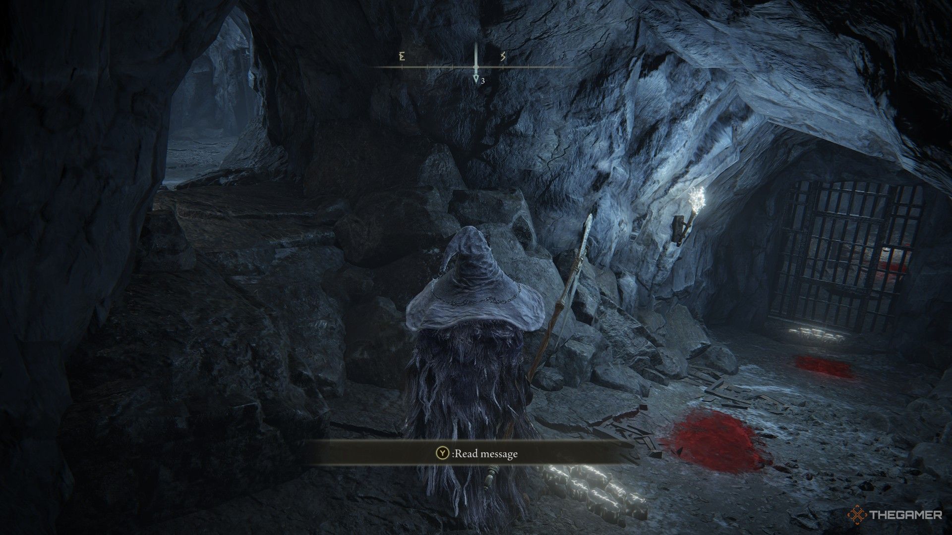 Player comes to a Y in the path of Lamenter's Gaol and pauses to look both ways in Elden Ring: Shadow of the Erdtree.