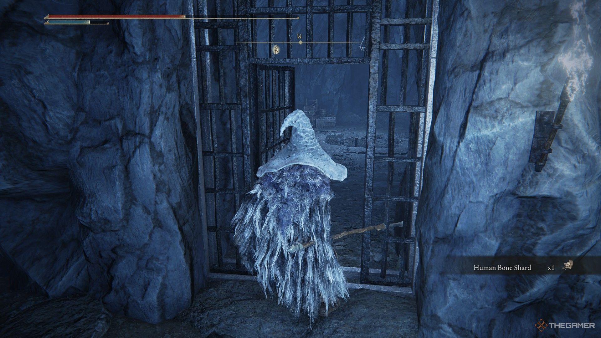 Player opens the westward door in the ice room of Lamenter's Gaol in Elden Ring: Shadow of the Erdtree.