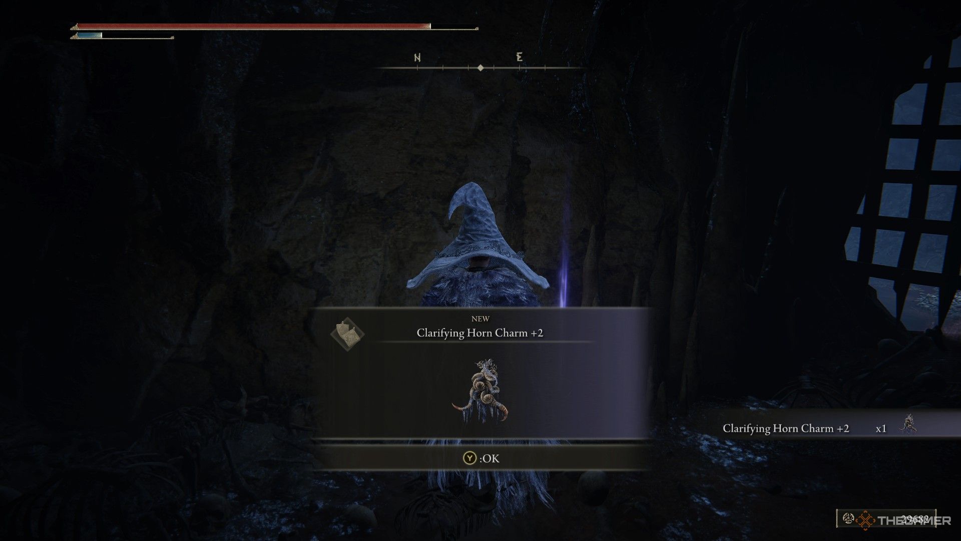 Player loots the Clarifying Horn Charm +2 from a corpse in Lamenter's Gaol in Elden Ring: Shadow of the Erdtree.