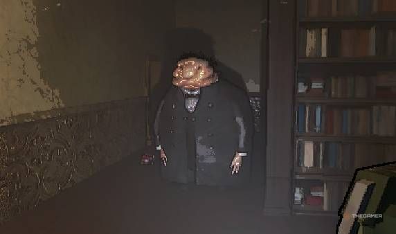 Butler standing still next to a bookshelf and preparing to attack in Lethal Company.
