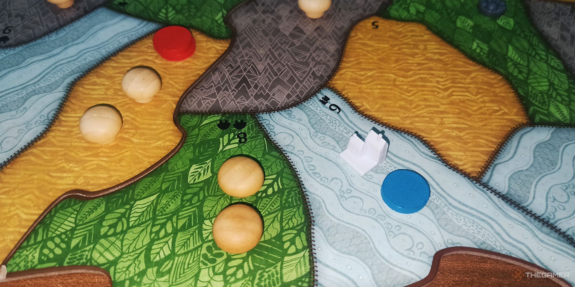  Players place their starting Presence tokens on the island in Spirit Island