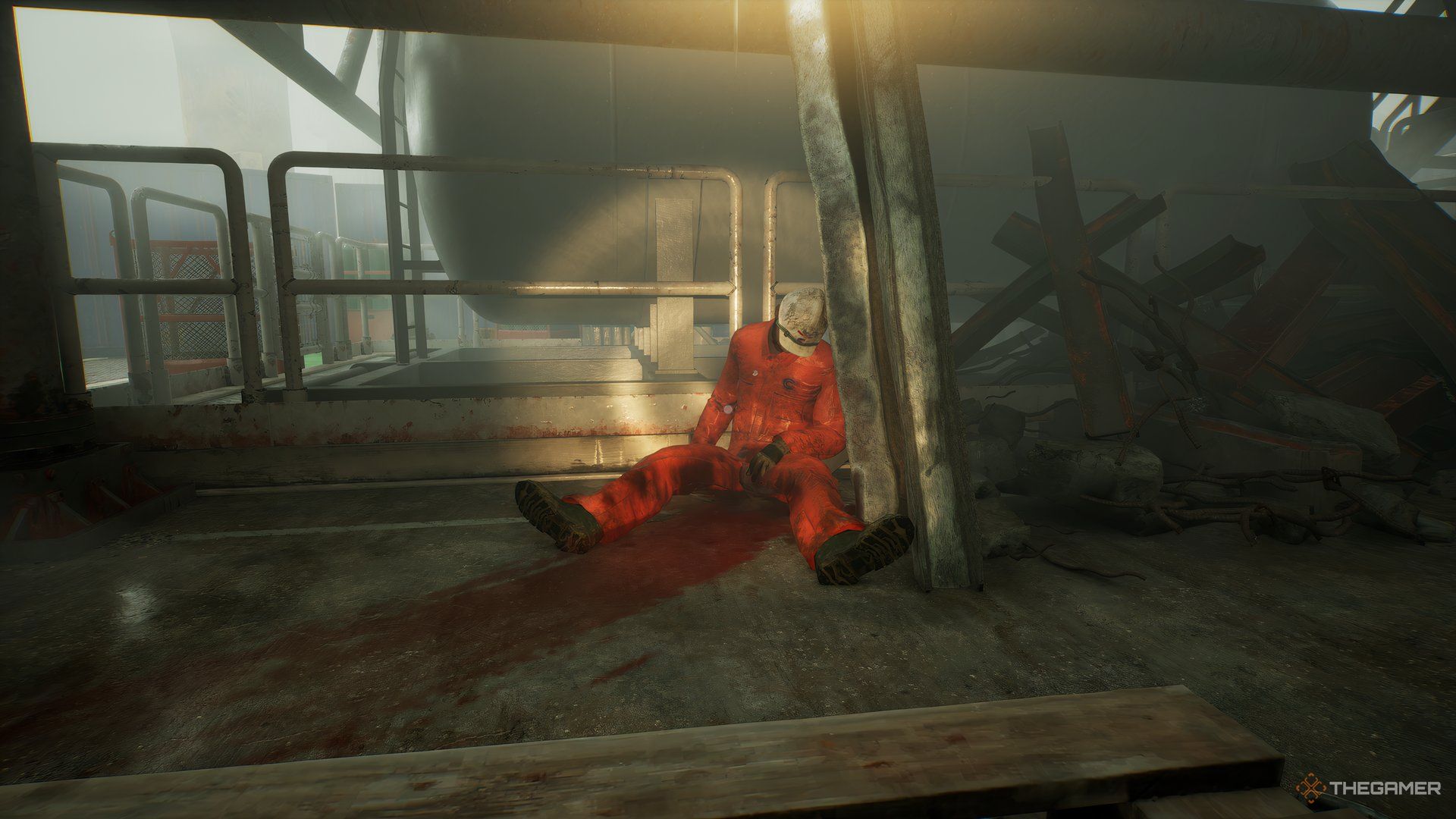 Sitting against a railing behind a bloody smear is the dead body of Dobbie in Still Wakes The Deep.