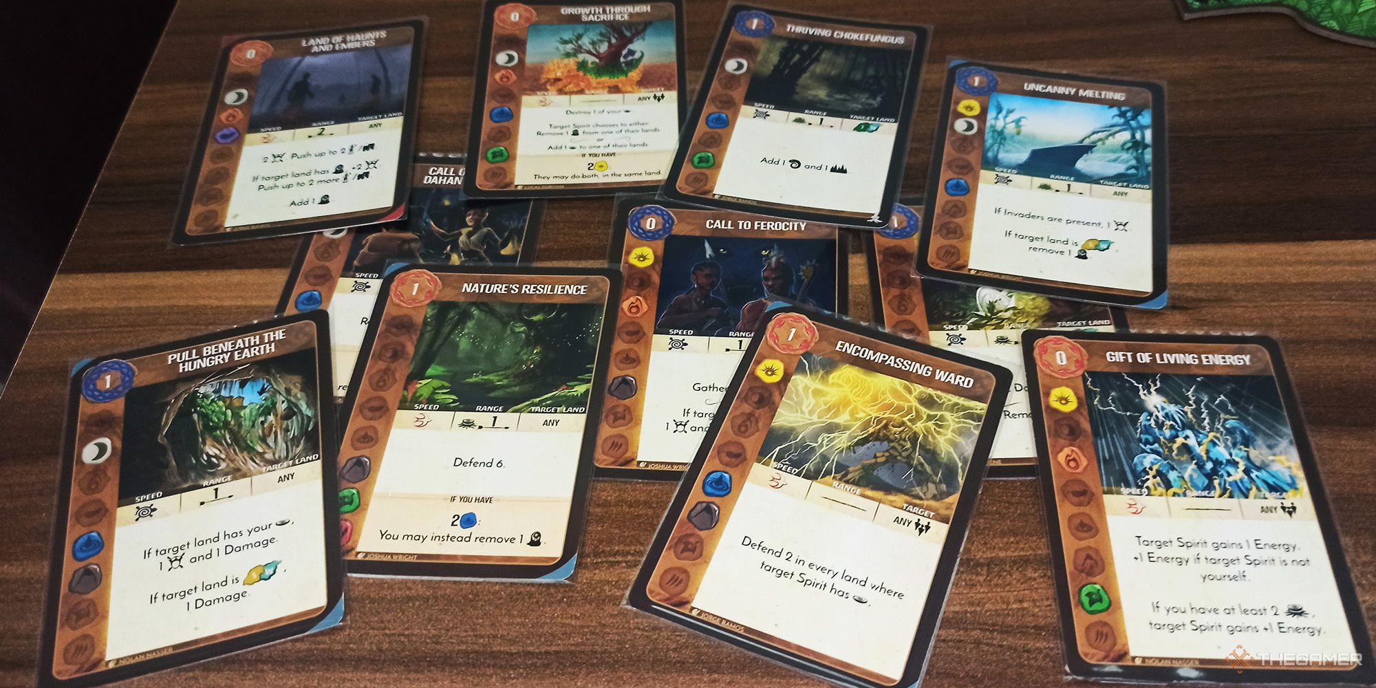 Power cards are shown scattered on the table in Spirit Island
