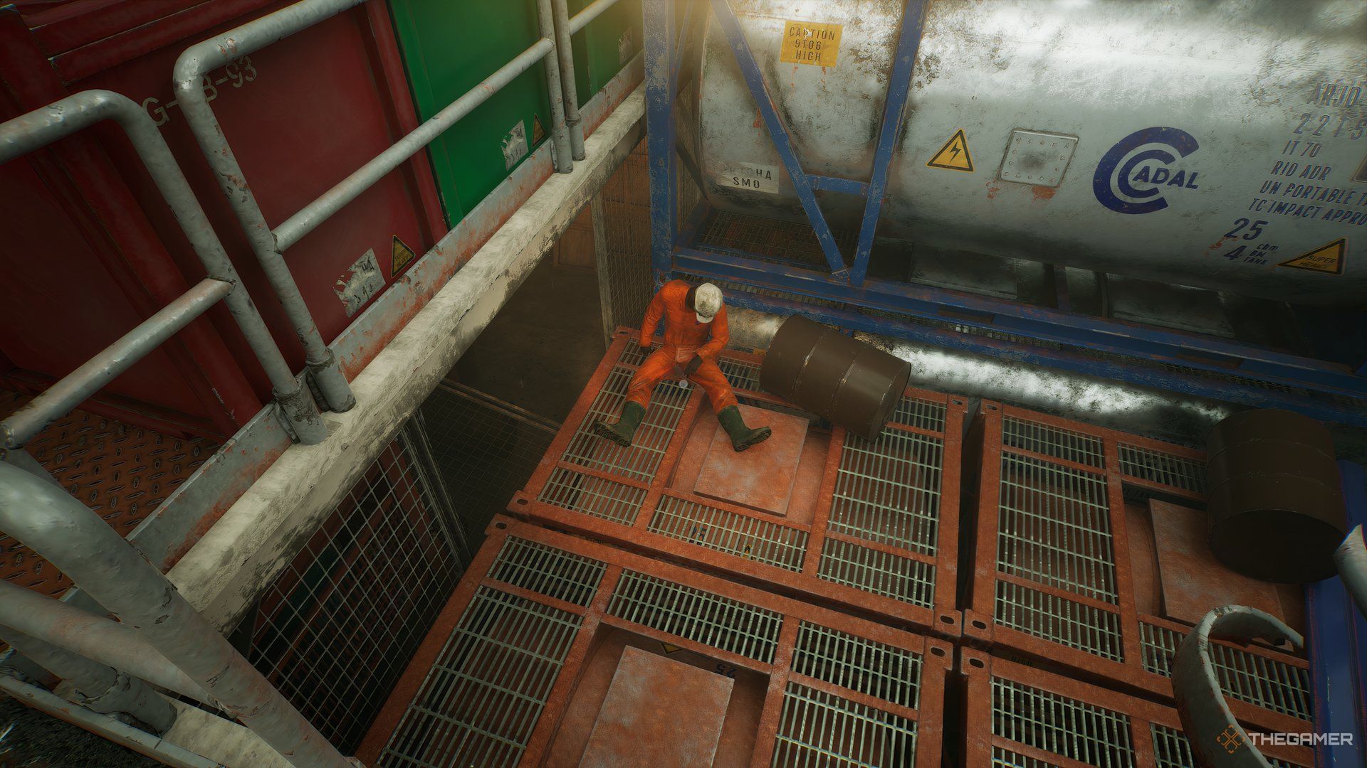 Dead body of Sunil sitting up on orange platform in Still Wakes The Deep.