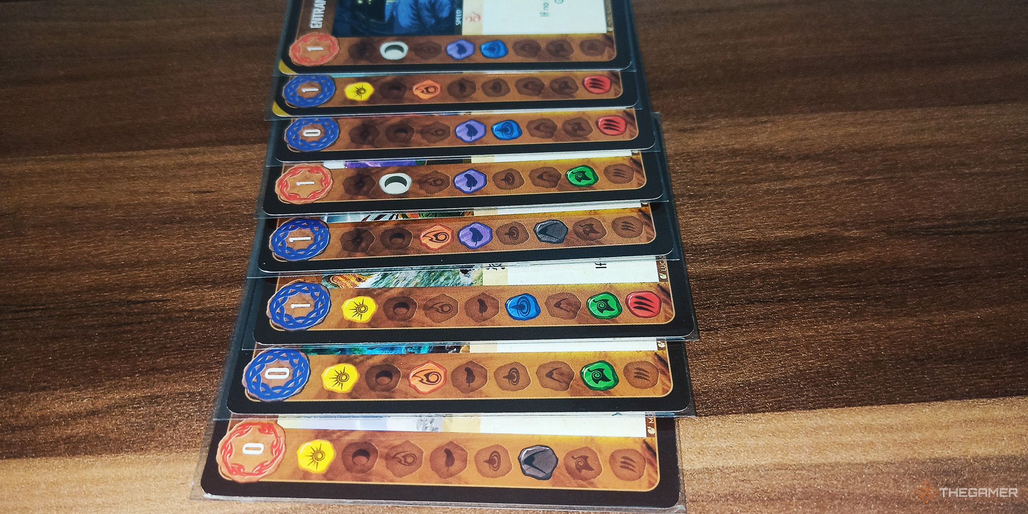 The cards are turned sideways to display their elements in Spirit Island