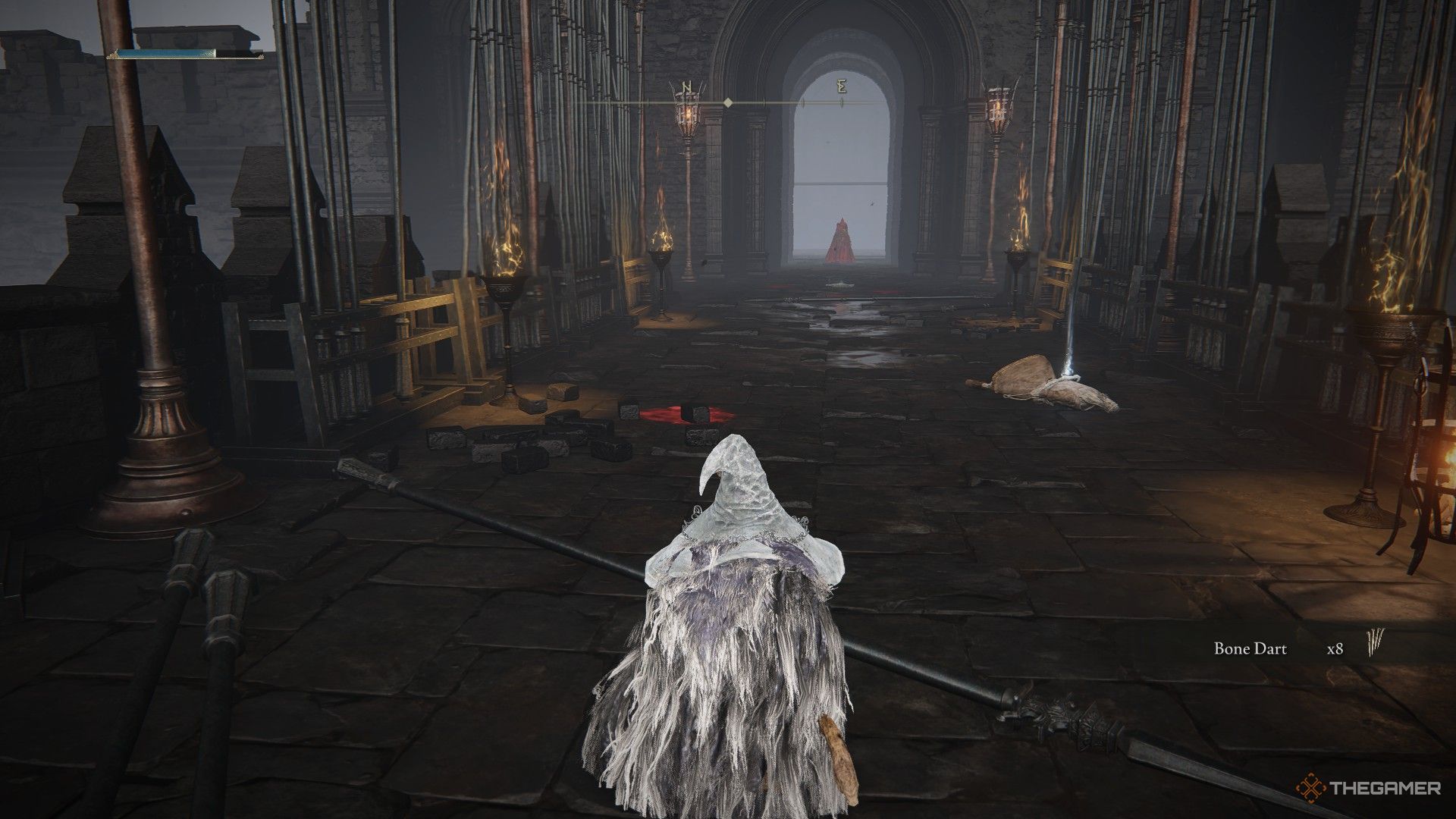 Player crouches and watches the first Fire Knight of Shadow Keep approach in Elden Ring: Shadow of the Erdtree.