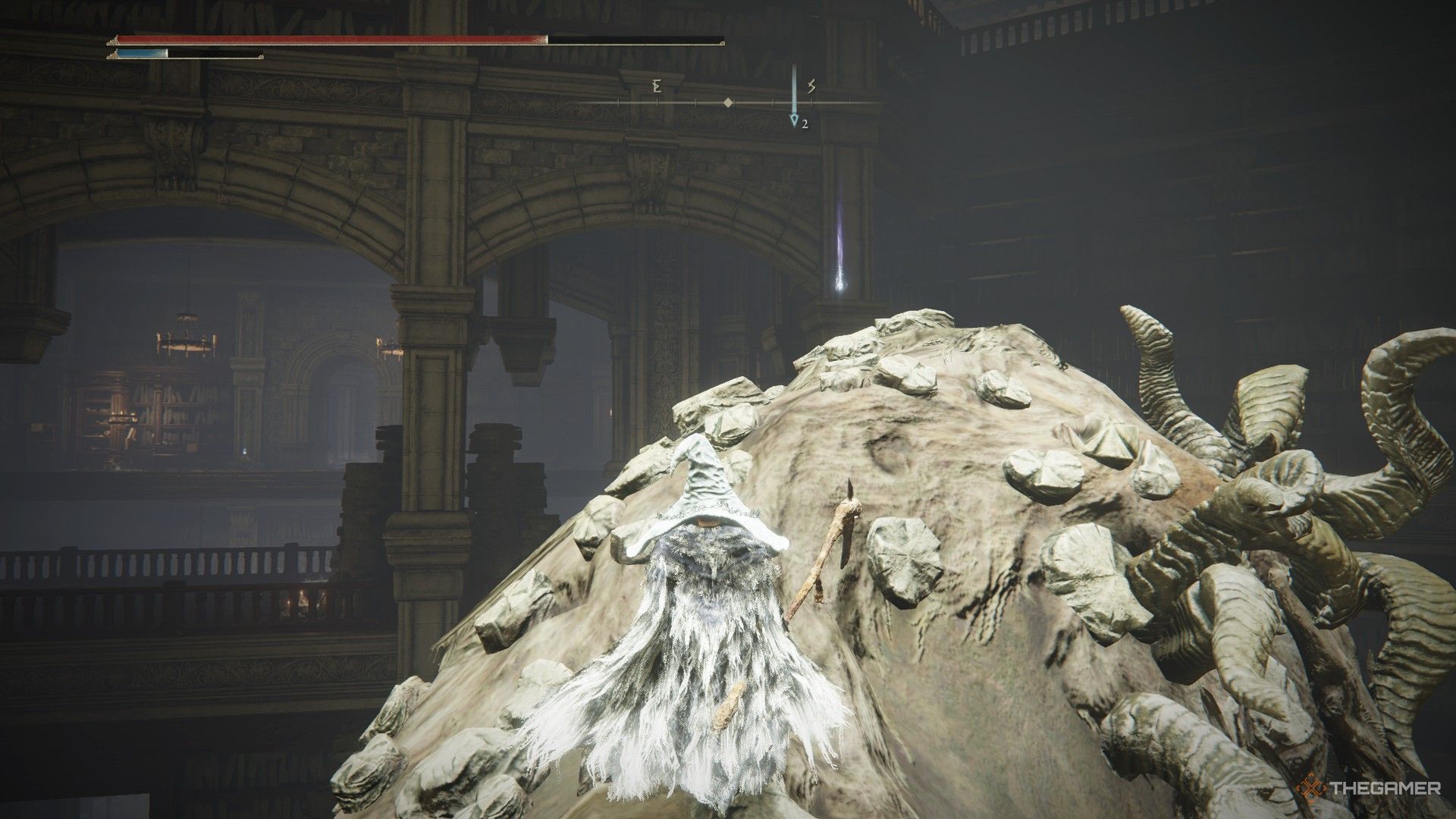 Player finds a Revered Spirit Ash atop a petrified specimen in the Shadow Keep in Elden Ring: Shadow of the Erdtree.