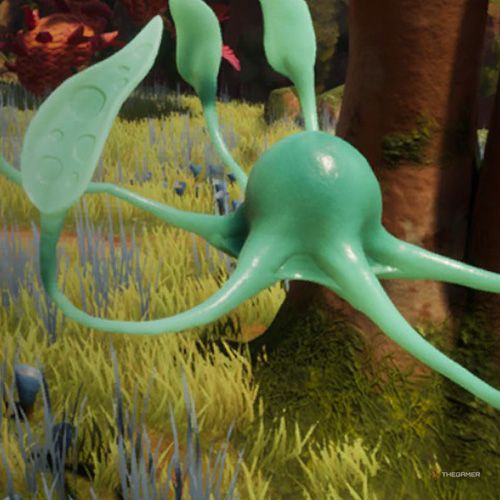 A Jellywaft is flying next to a column-shaped rock in Journey To The Savage Planet.