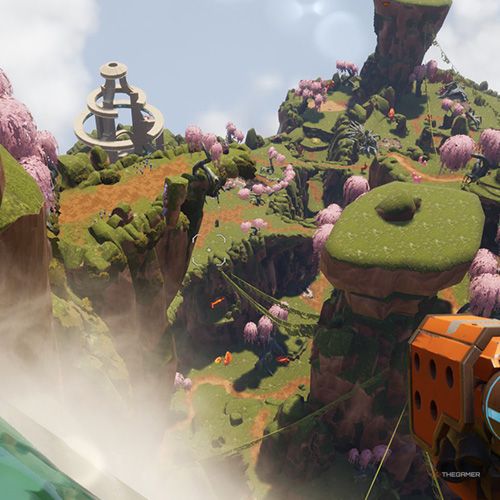 The player is looking at the view from the flow point of the waterfall in Journey To The Savage Planet.