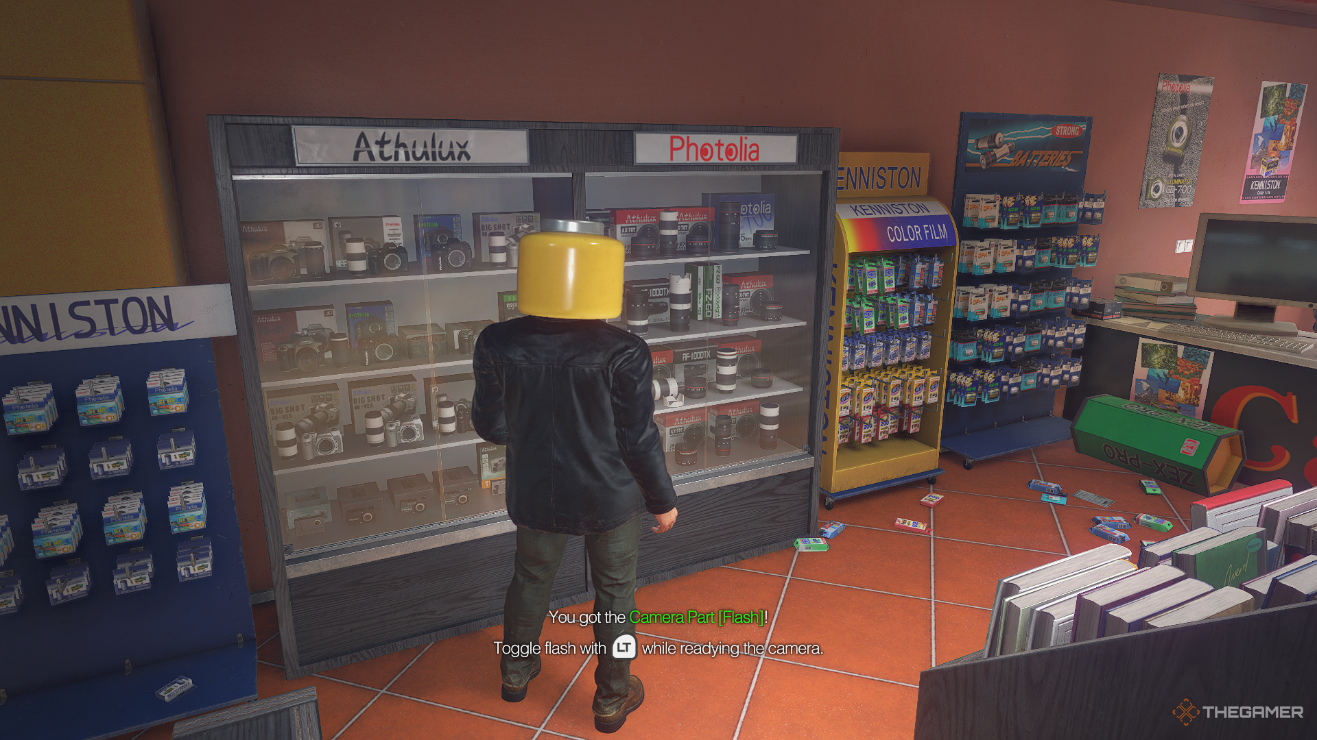 Frank unlocking the Flash camera upgrade in Dead Rising Deluxe Remaster.