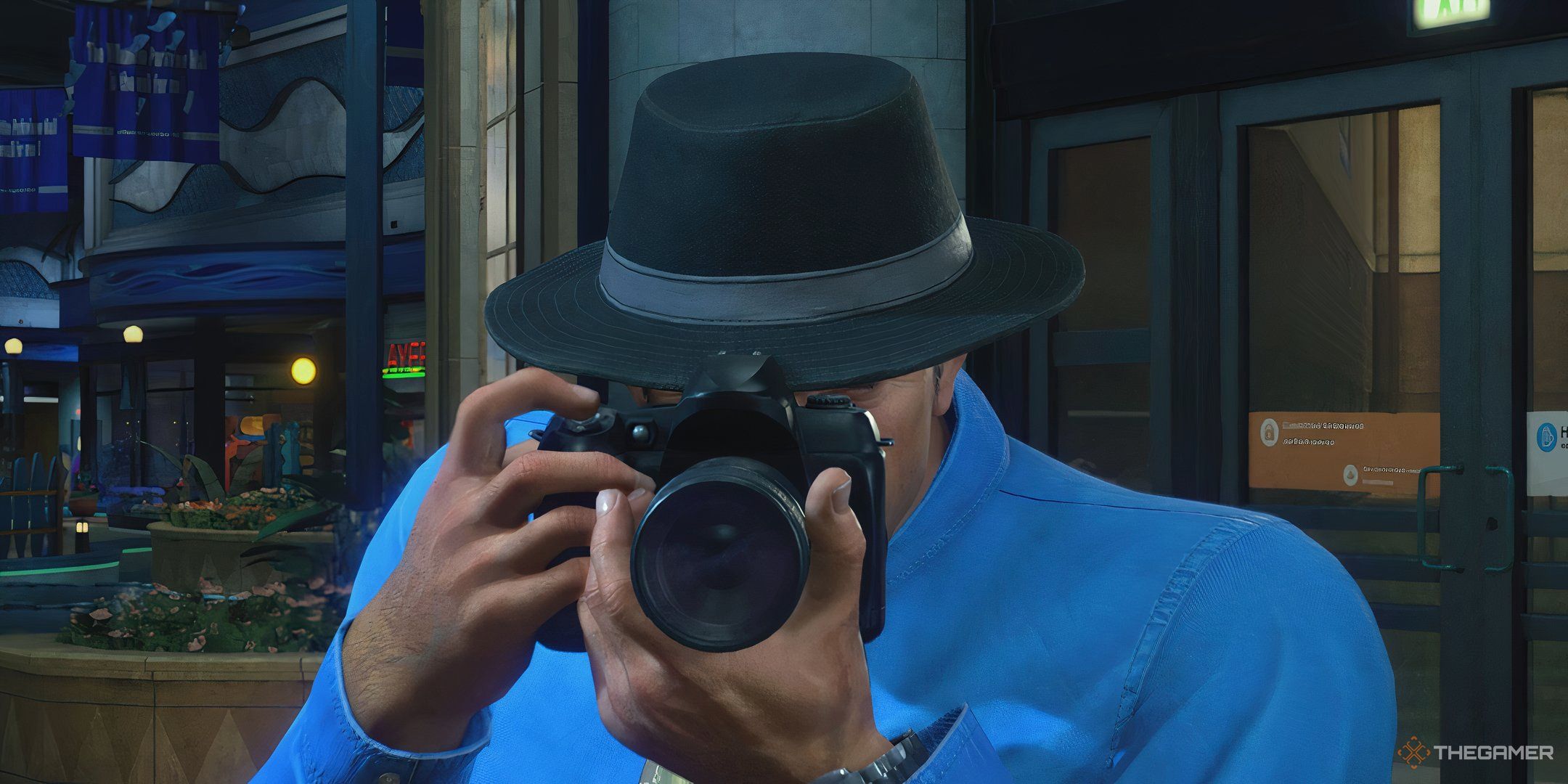 Frank West holding a camera in Dead Rising Deluxe Remaster.