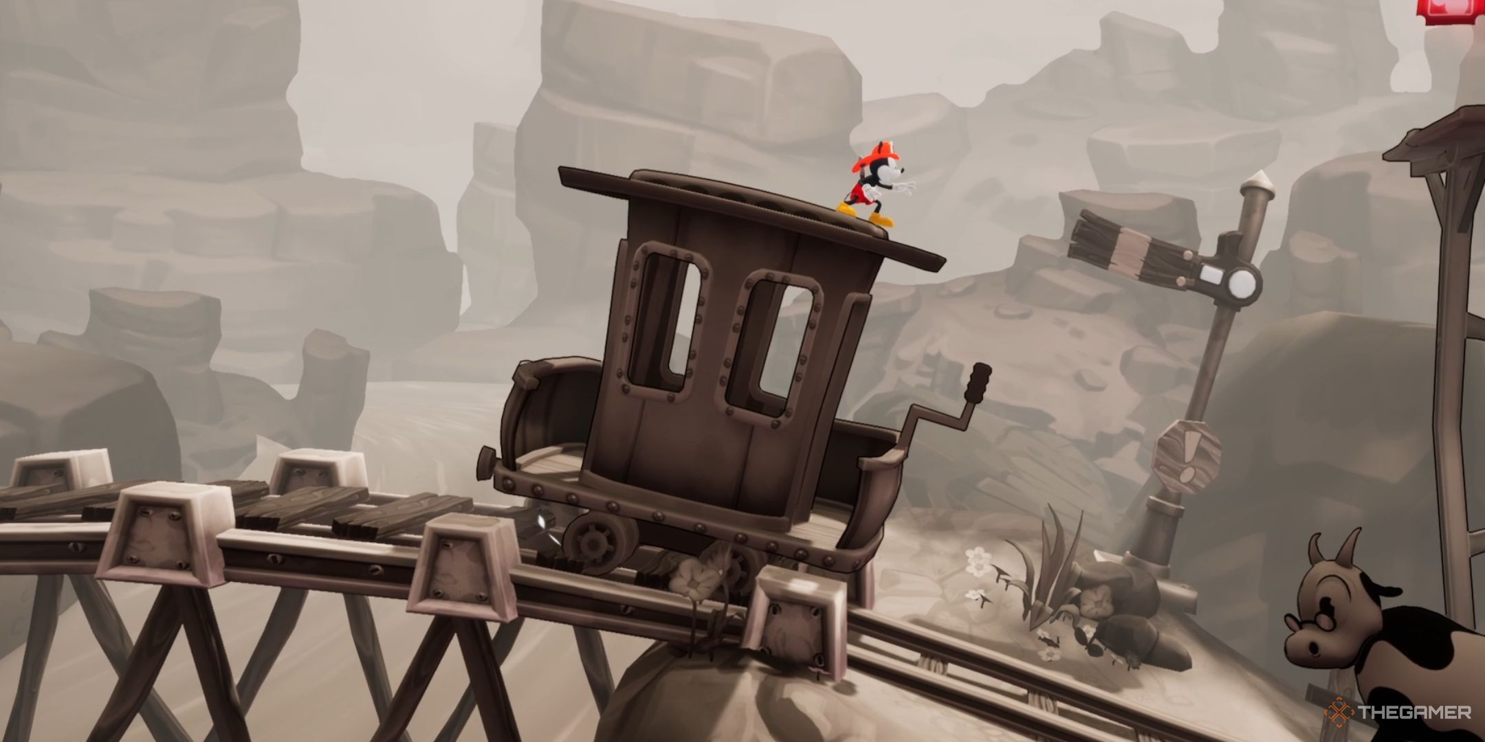 Disney Epic Mickey Rebrushed on trolley in Trolley Troubles side scrolling level.