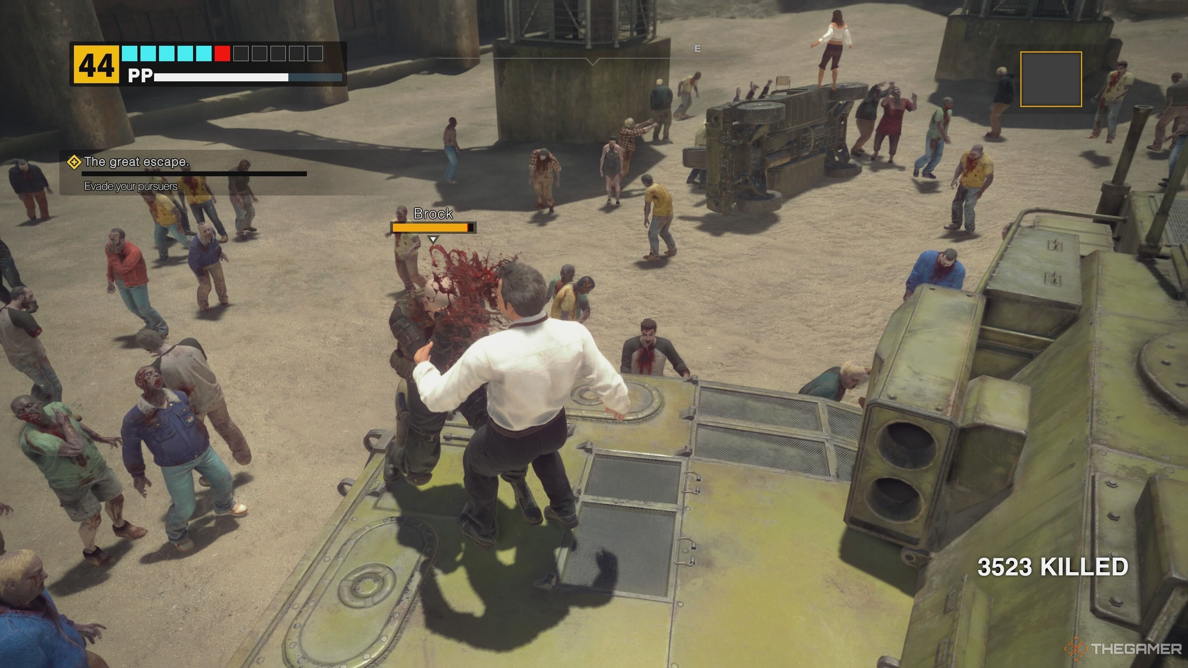 Frank getting hit by Brock in Dead Rising Deluxe Remaster.