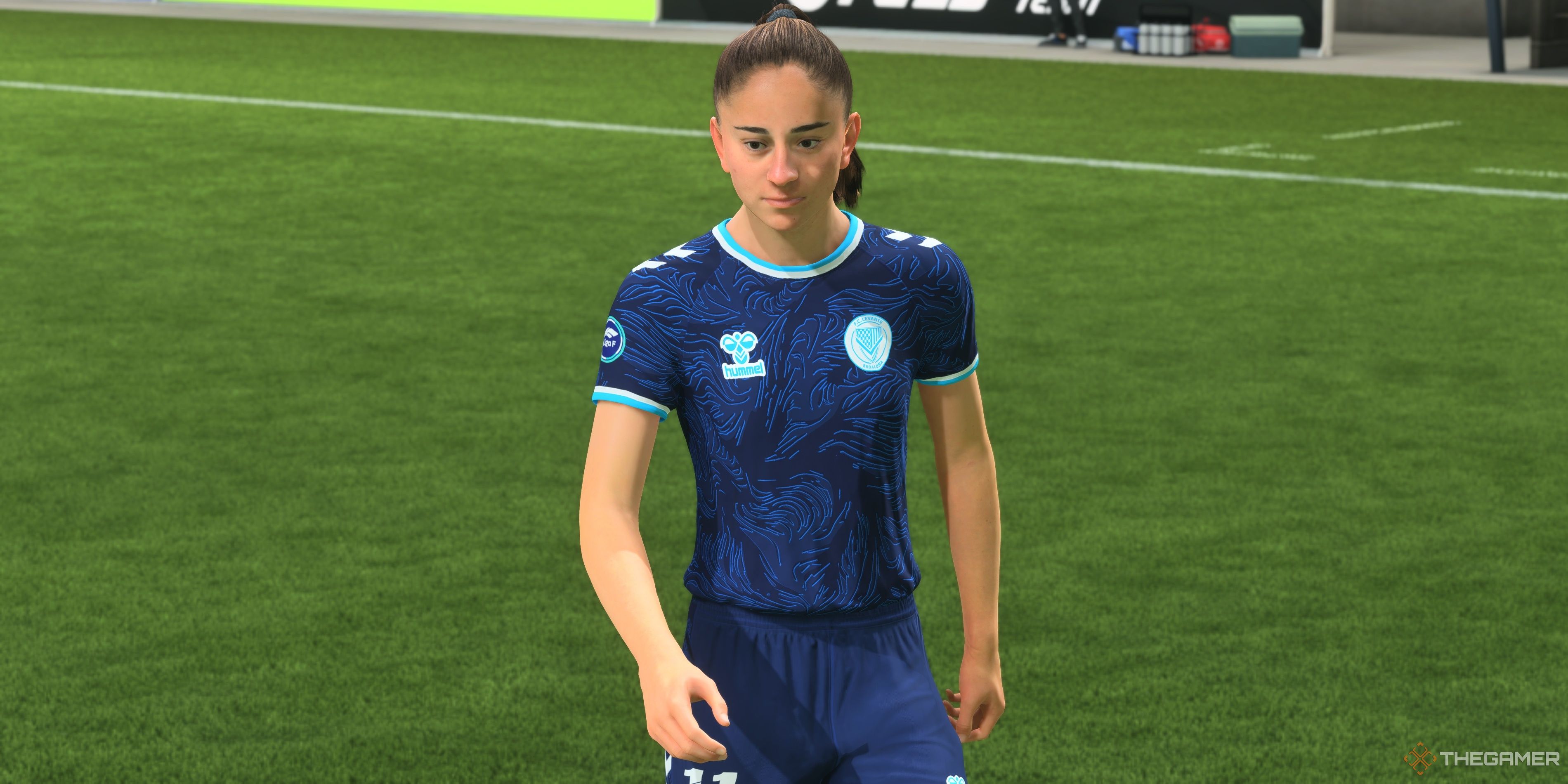 Elena Julve Perez walking across the pitch in EA Sports FC 25.