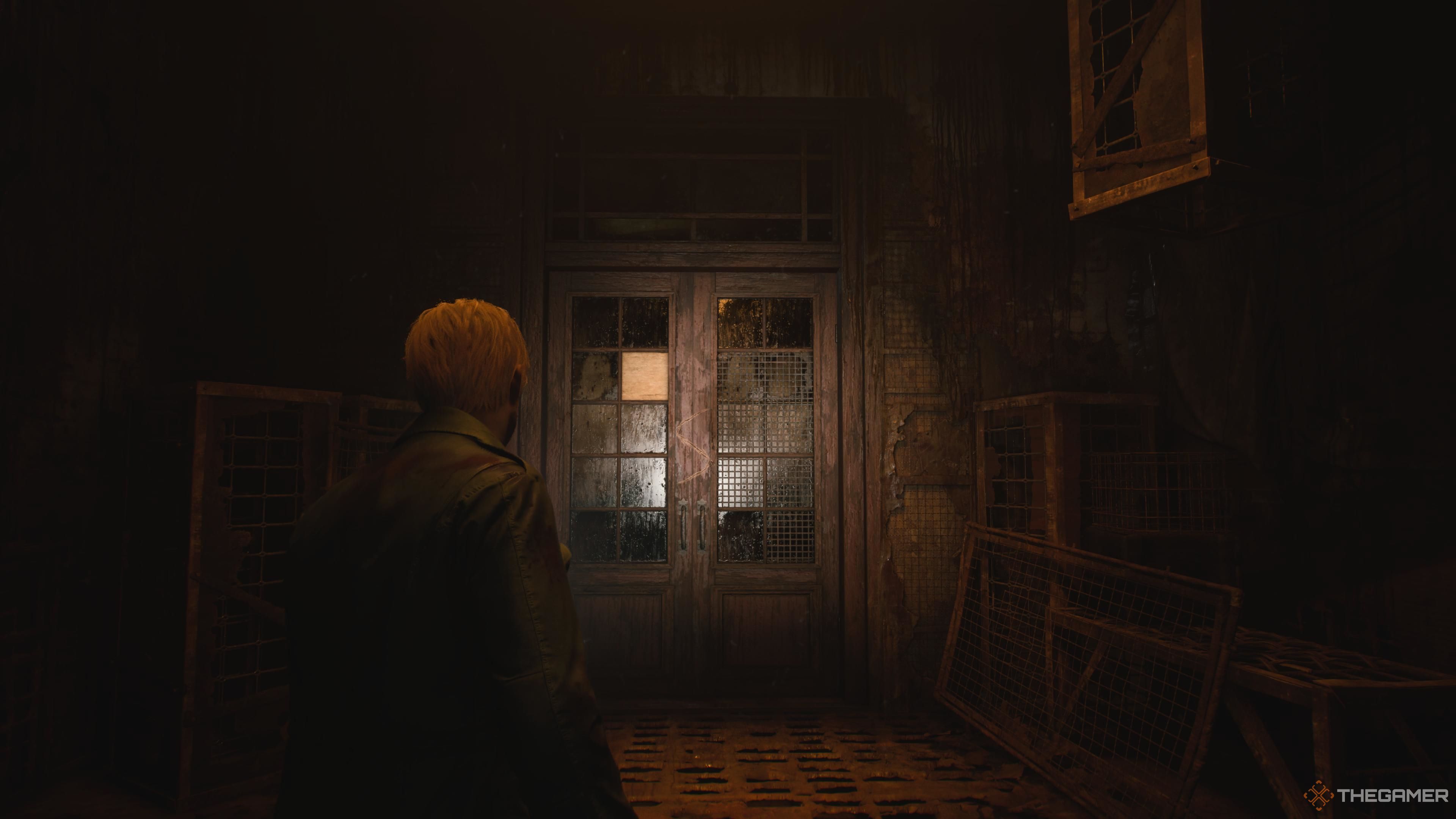 Silent Hill 2. Blue Creek Apartments. The door with the S carved into it.