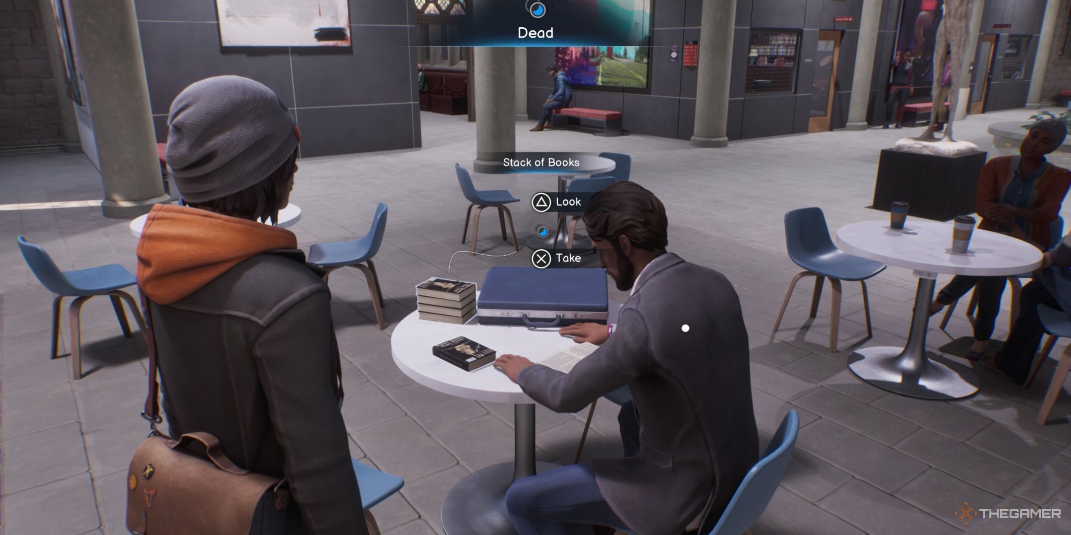 Max looks at Lucas Colmenero who is seated in the Fine Arts Building with a stack of books in Life is Strange Double Exposure.