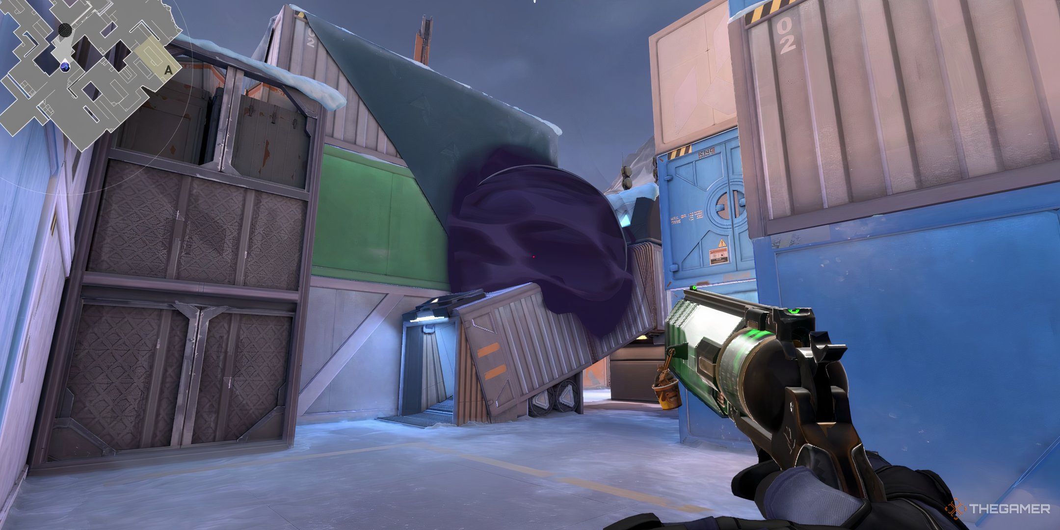Omen's smoke atop a grey, slanted tube in Valorant's Icebox map.