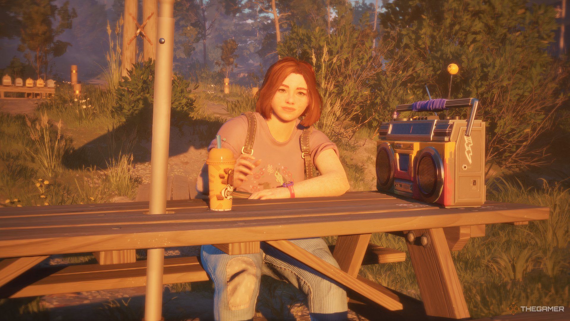 Swann chilling on a bench with a slushie at sunset.