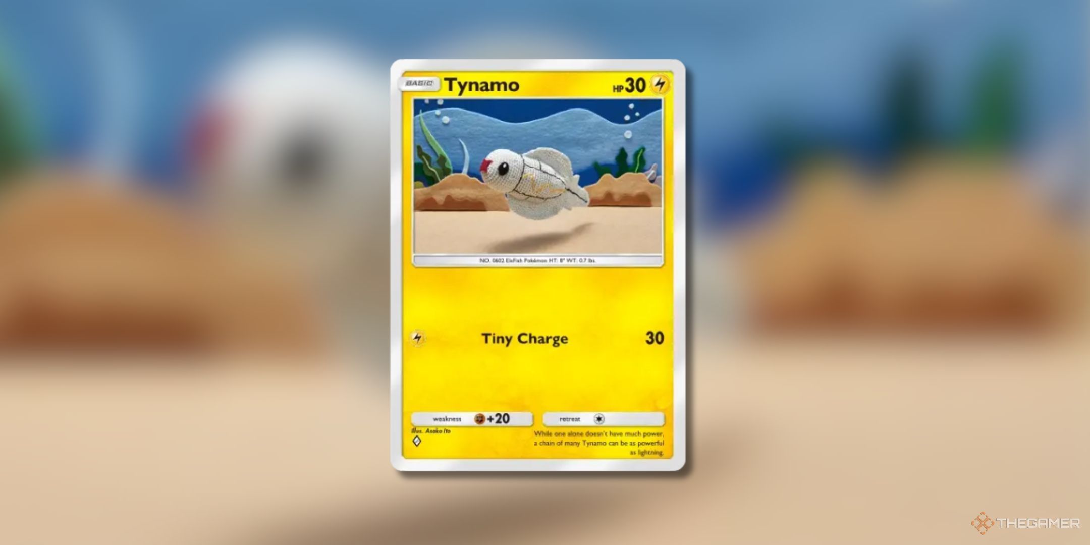 Pokemon Trading Card Game Pocket Tynamo one diamond rarity card on a blurred background.