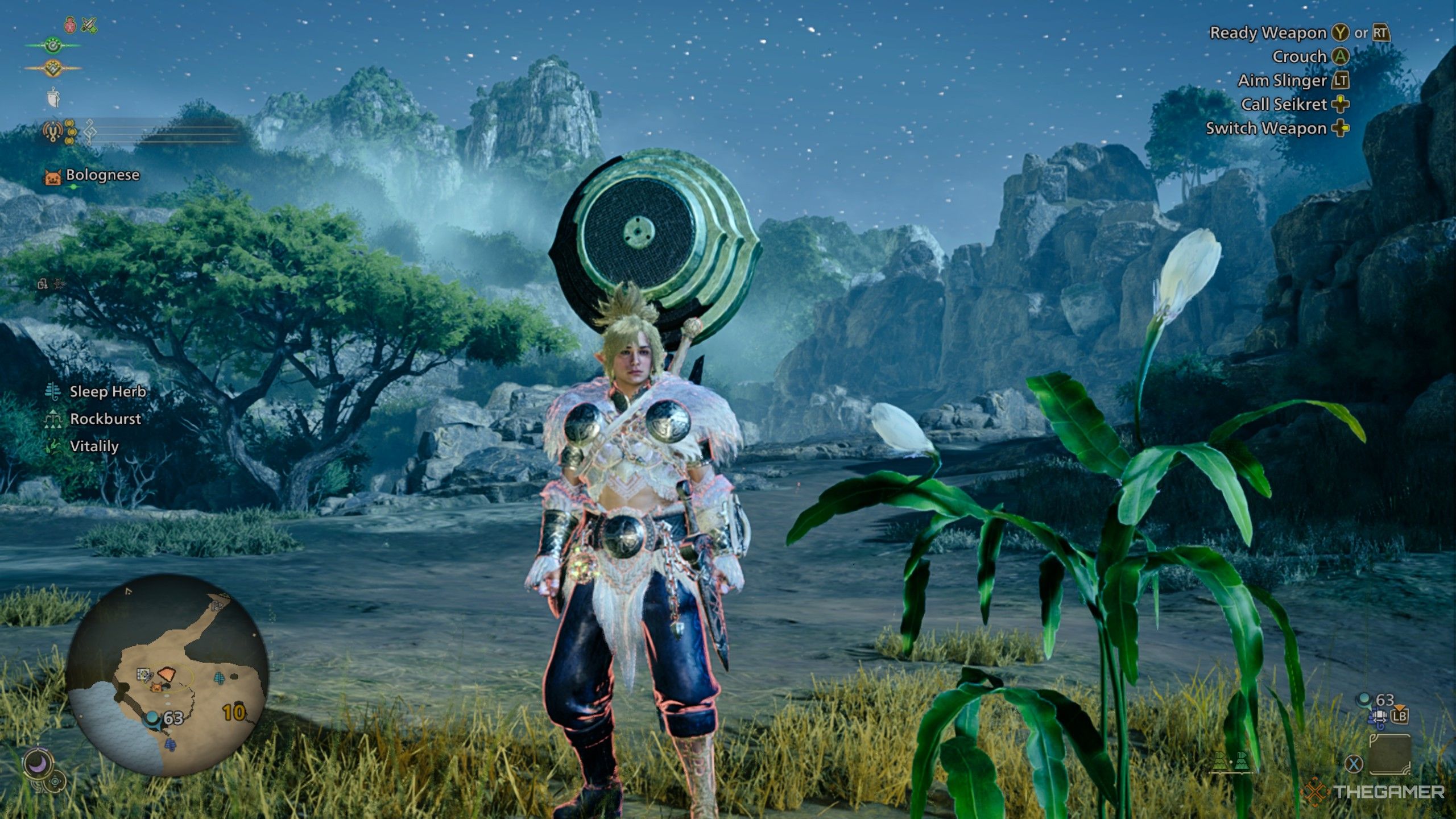 a hunter standing beside an unbloomed ephemeral bloom in monster hunter wilds.