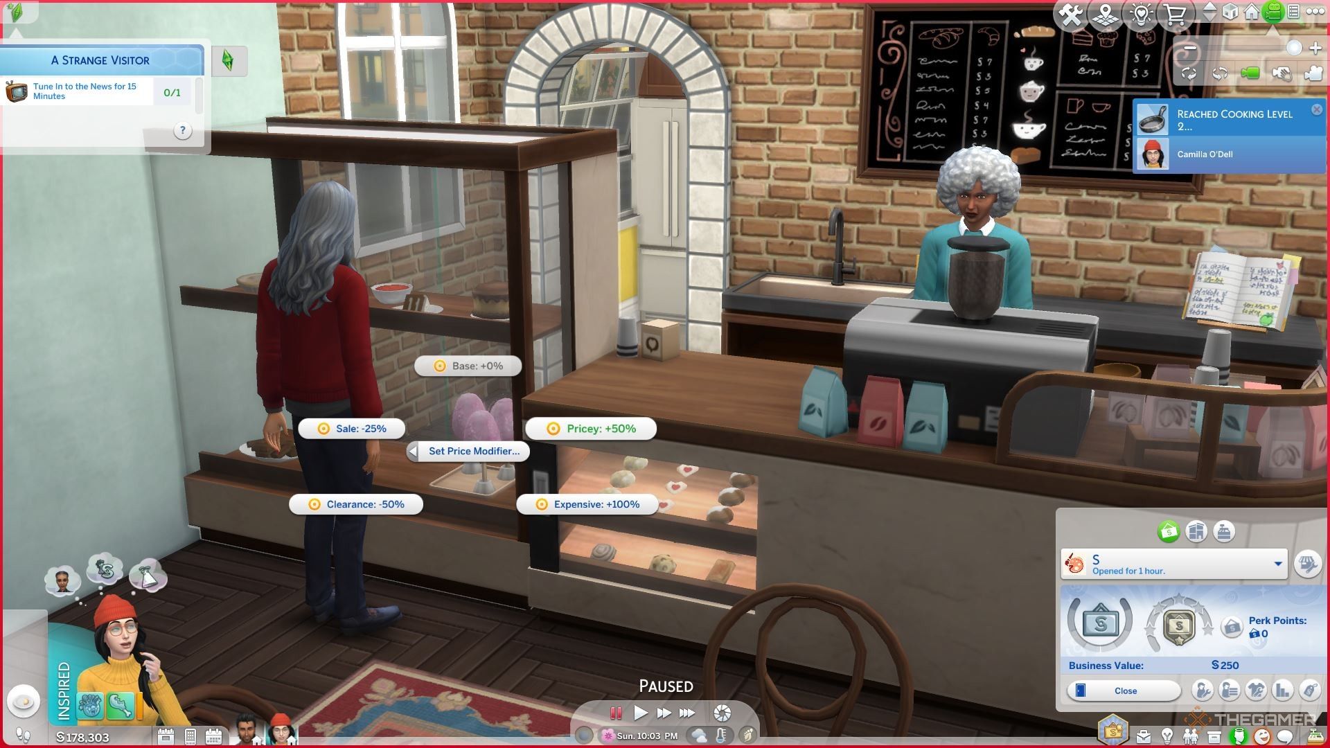 Adjusting prices on a display of desserts in The Sims 4 Business and Hobbies when running a bakery.