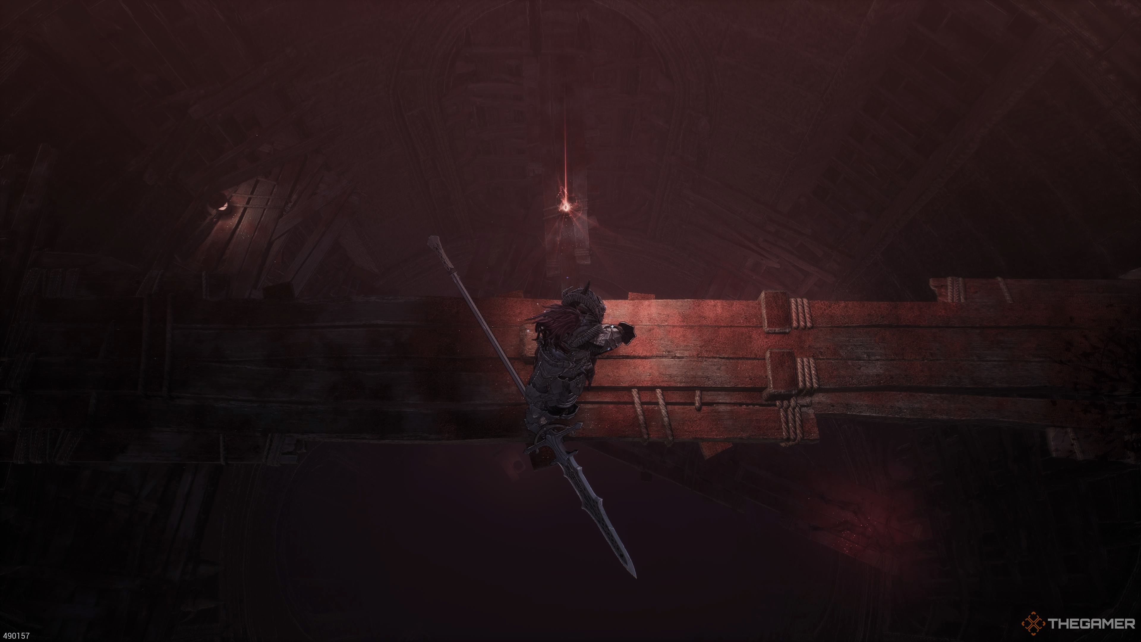 The Beastslayer's Scroll resting on a plank in the Why Have You Forsaken Us Stage in The First Berserker Khazan.
