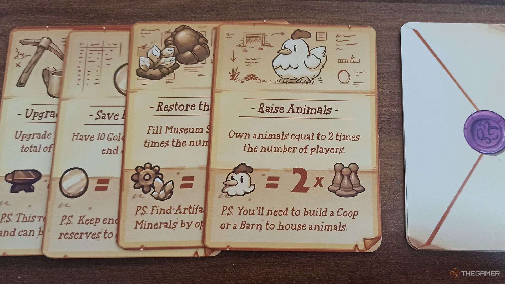 Four Grandpa's Goal cards next to the deck in Stardew Valley: Board Game.