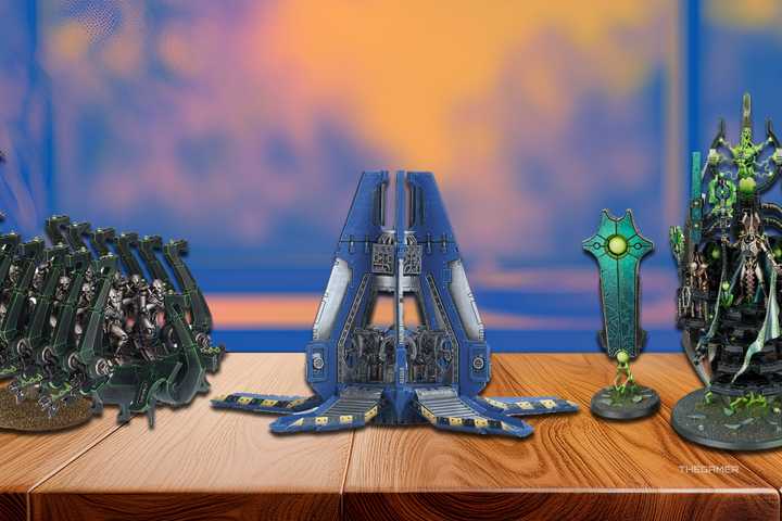 Ghost Ark, Szarekh, The Silent Kind and Drop Pod miniatures on a wooden table in Warhammer 40,000.