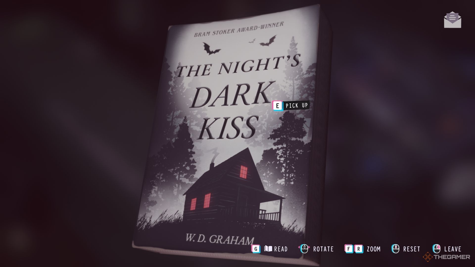 A copy of The Night's Dark Kiss novel.