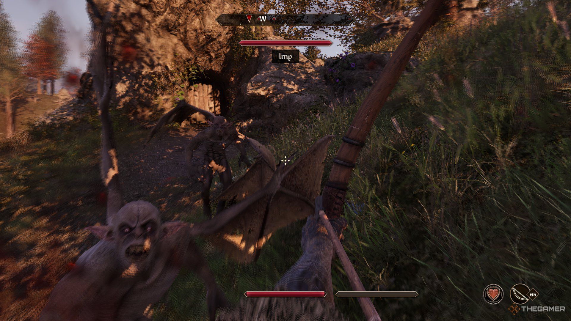 Player being attacked my two imps. He is holding a bow and about to shoot out an arrow.