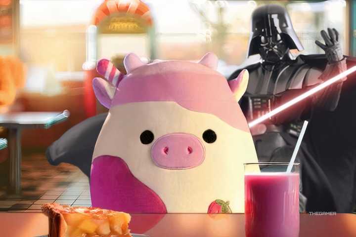 darth vader standing behind a cow squishmallow in a cafe.