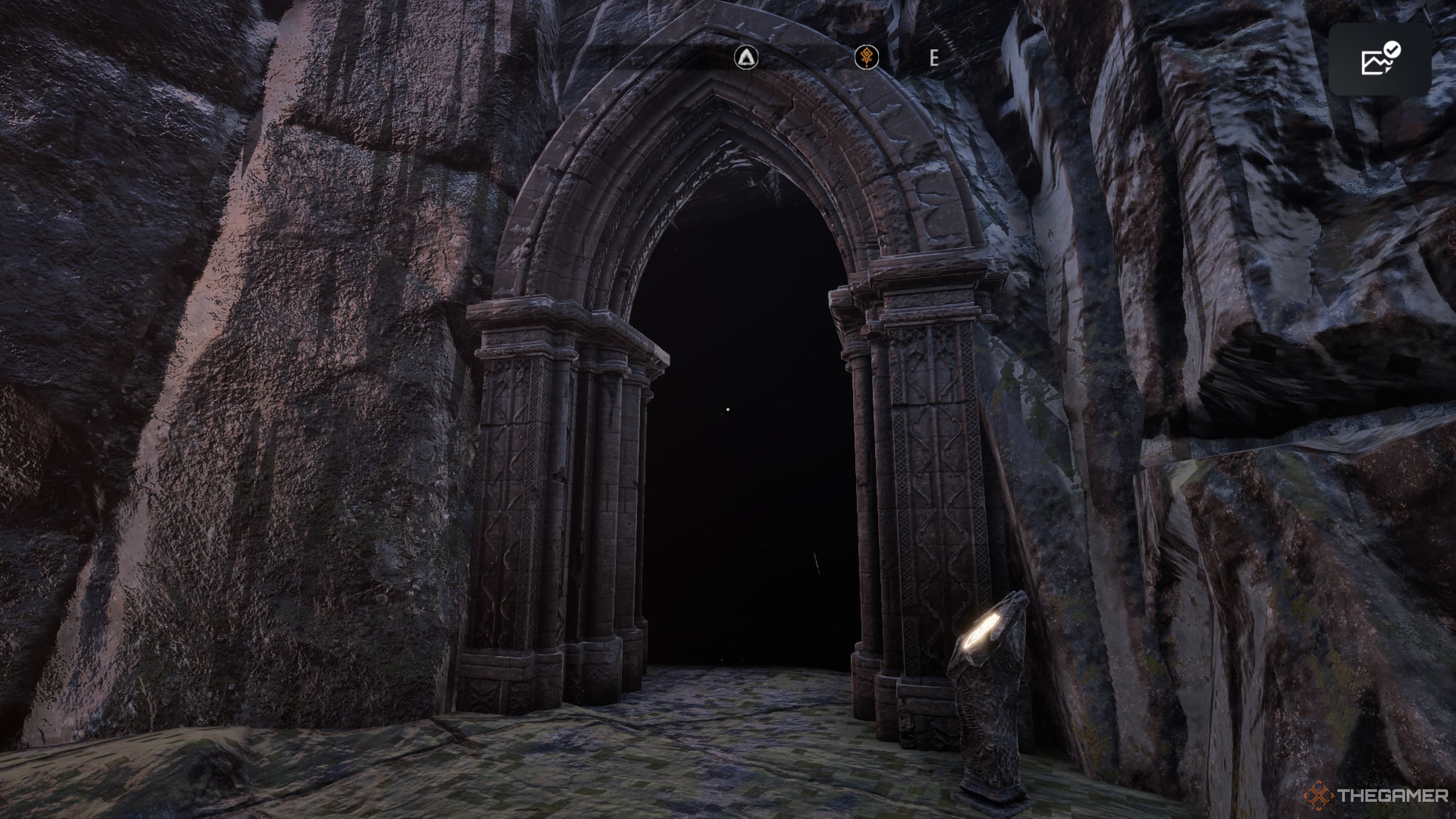 Player character standing in front of a large ornate doorway with an altar with a glowing symbol on it nearby in Tainted Grail: The Fall Of Avalon.