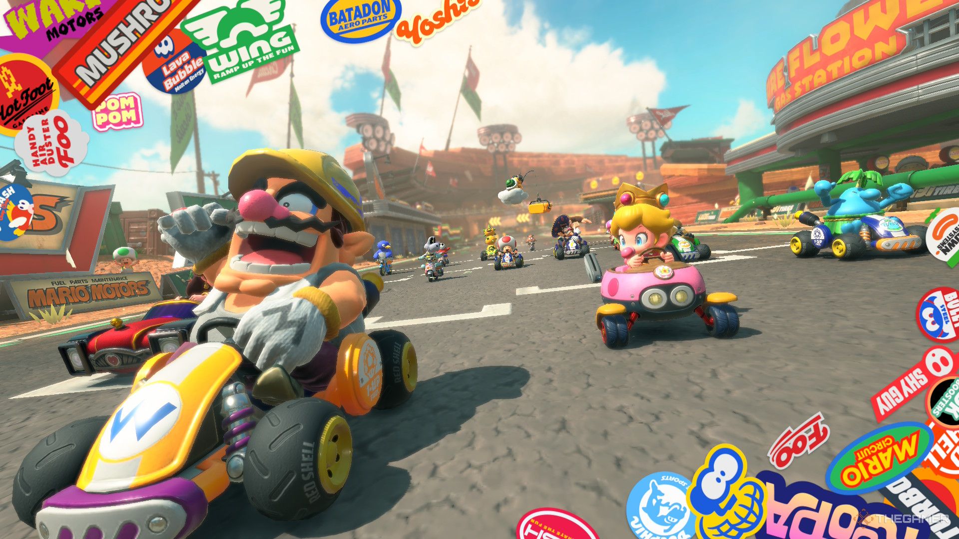wario and rosaline in a race beside each other with more racers behind them in mario kart world.
