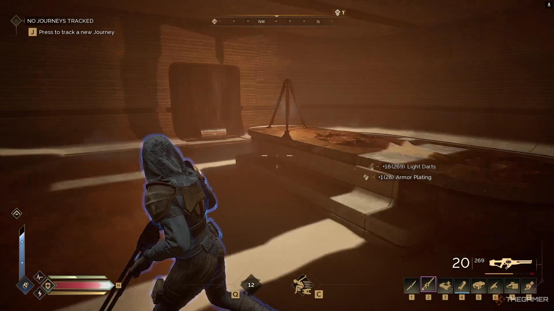 A chest sits in a dark alcove in Dune Awakening.