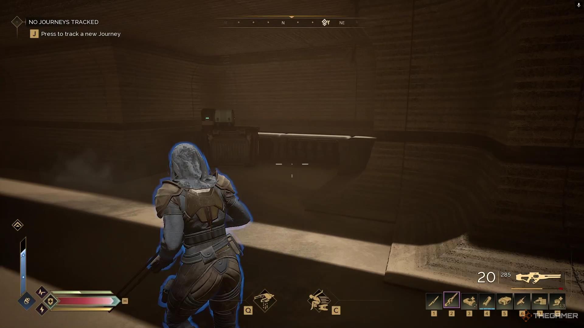 A chest sits in an alcove in a hallway in Dune Awakening.