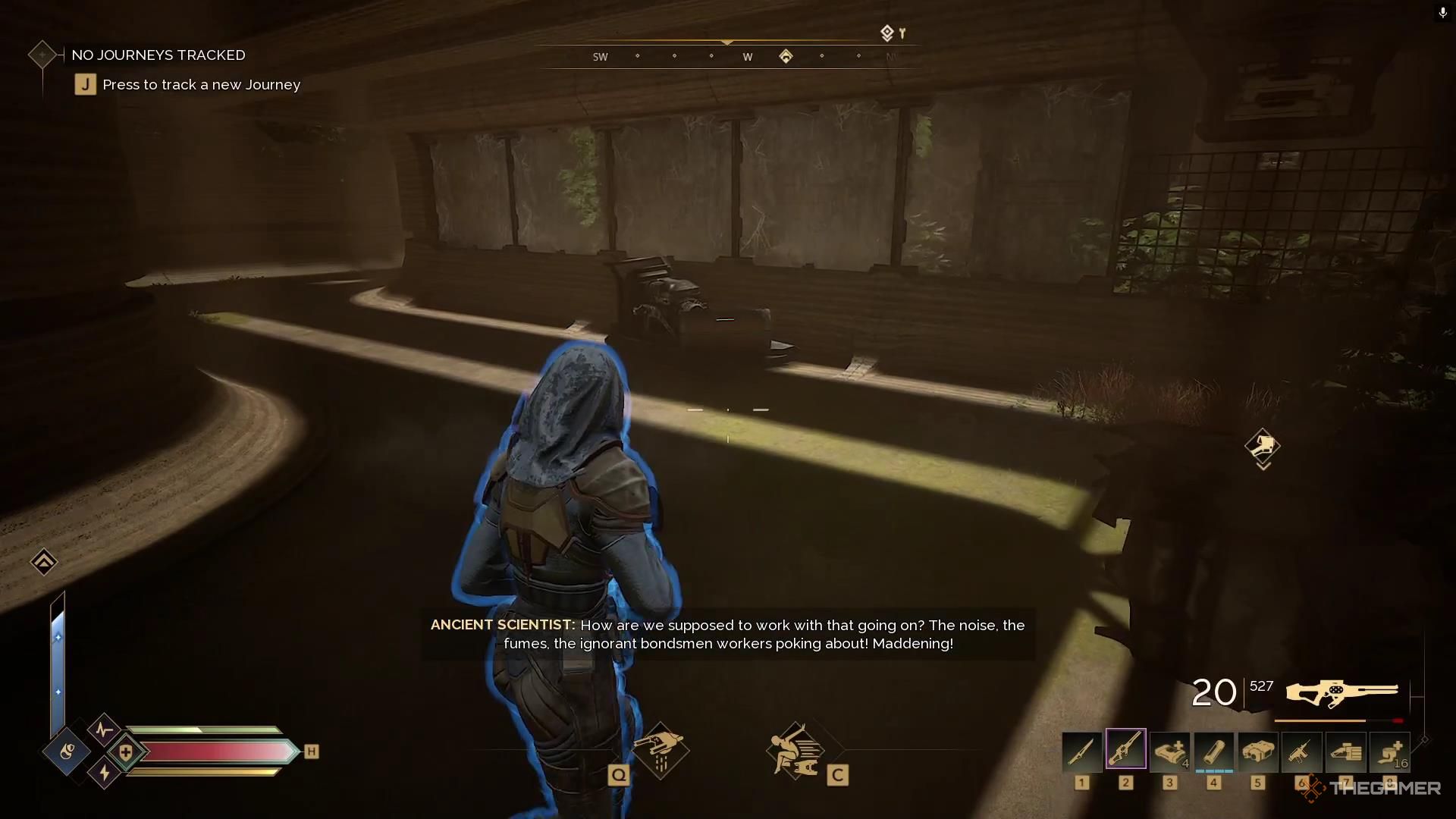 A hallway bends around a corner and has a chest near some glass windows in Dune Awakening.