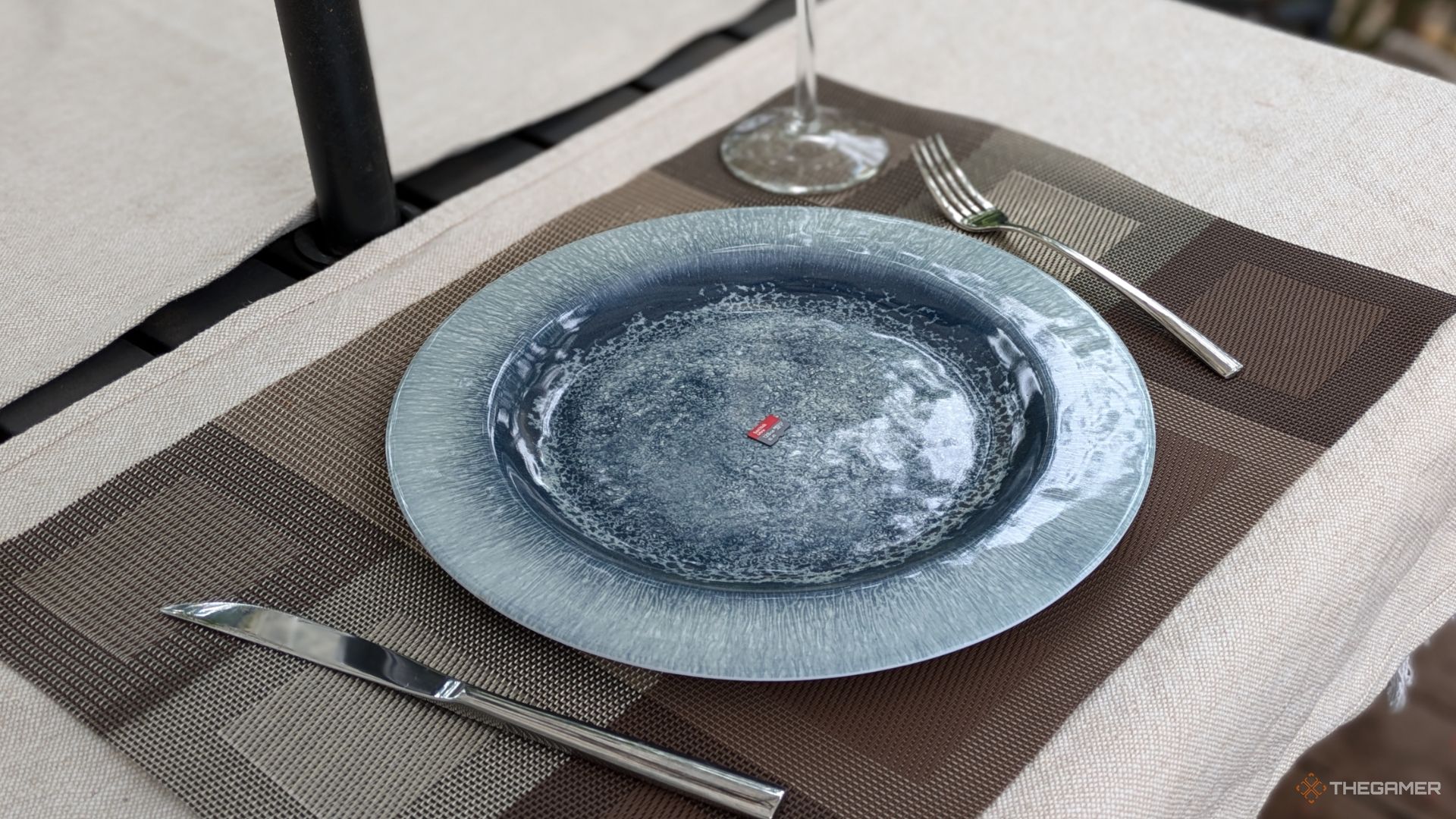 A Micro SD Card On A Plate.