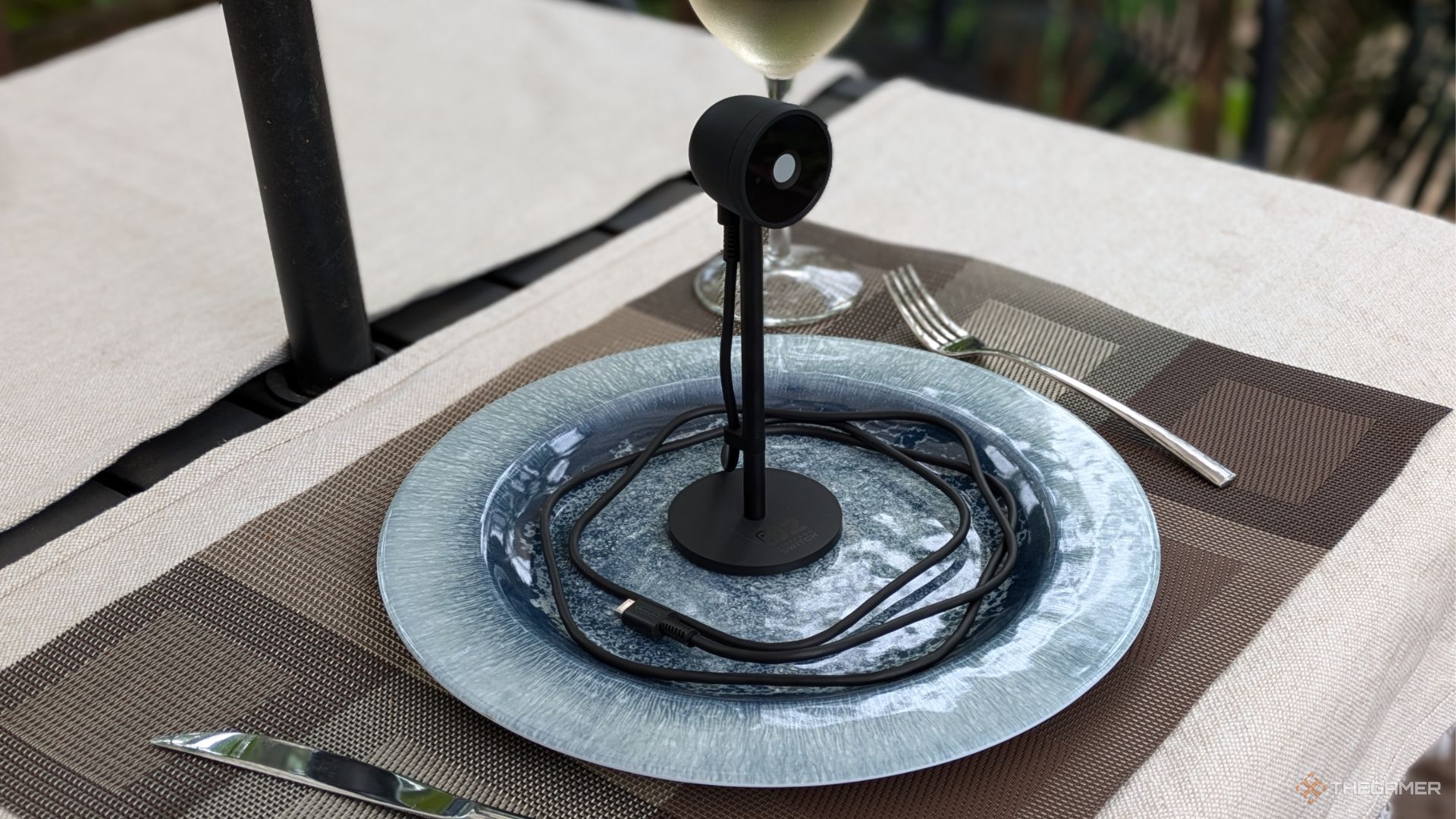 A Nintendo Switch 2 Camera On A Plate.