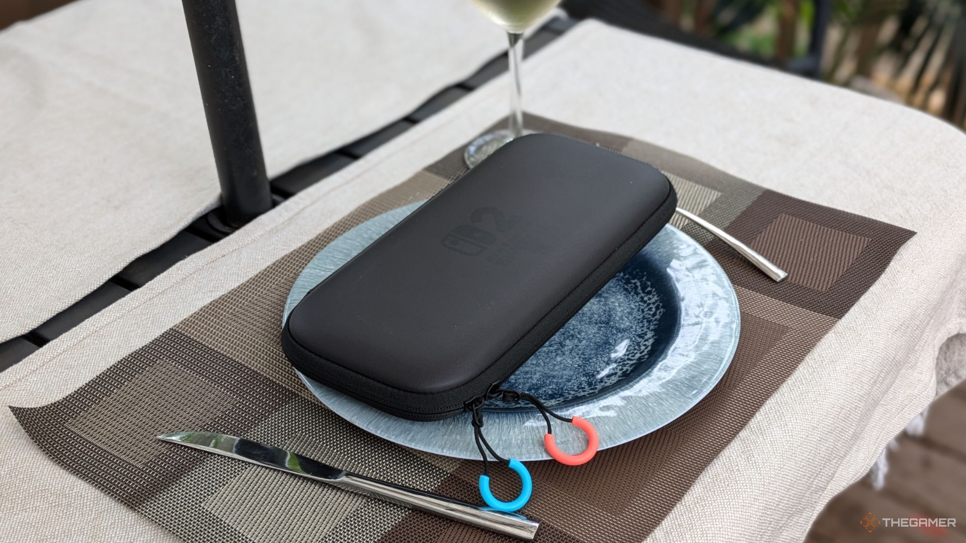 A Nintendo Switch 2 Carrying Case On A Plate.