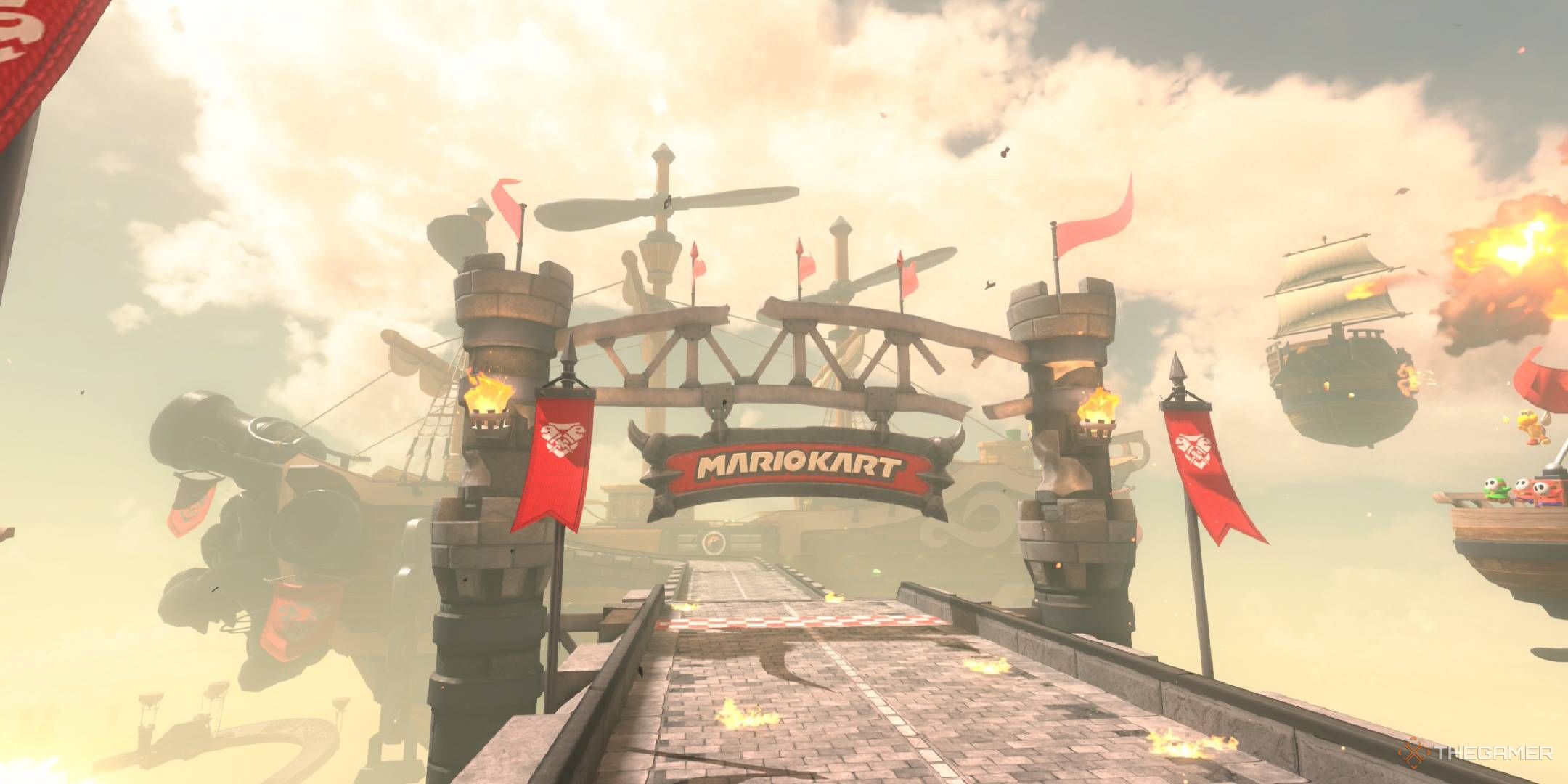 Airship Fortress starting line with giant airship in the background from Mario Kart World.