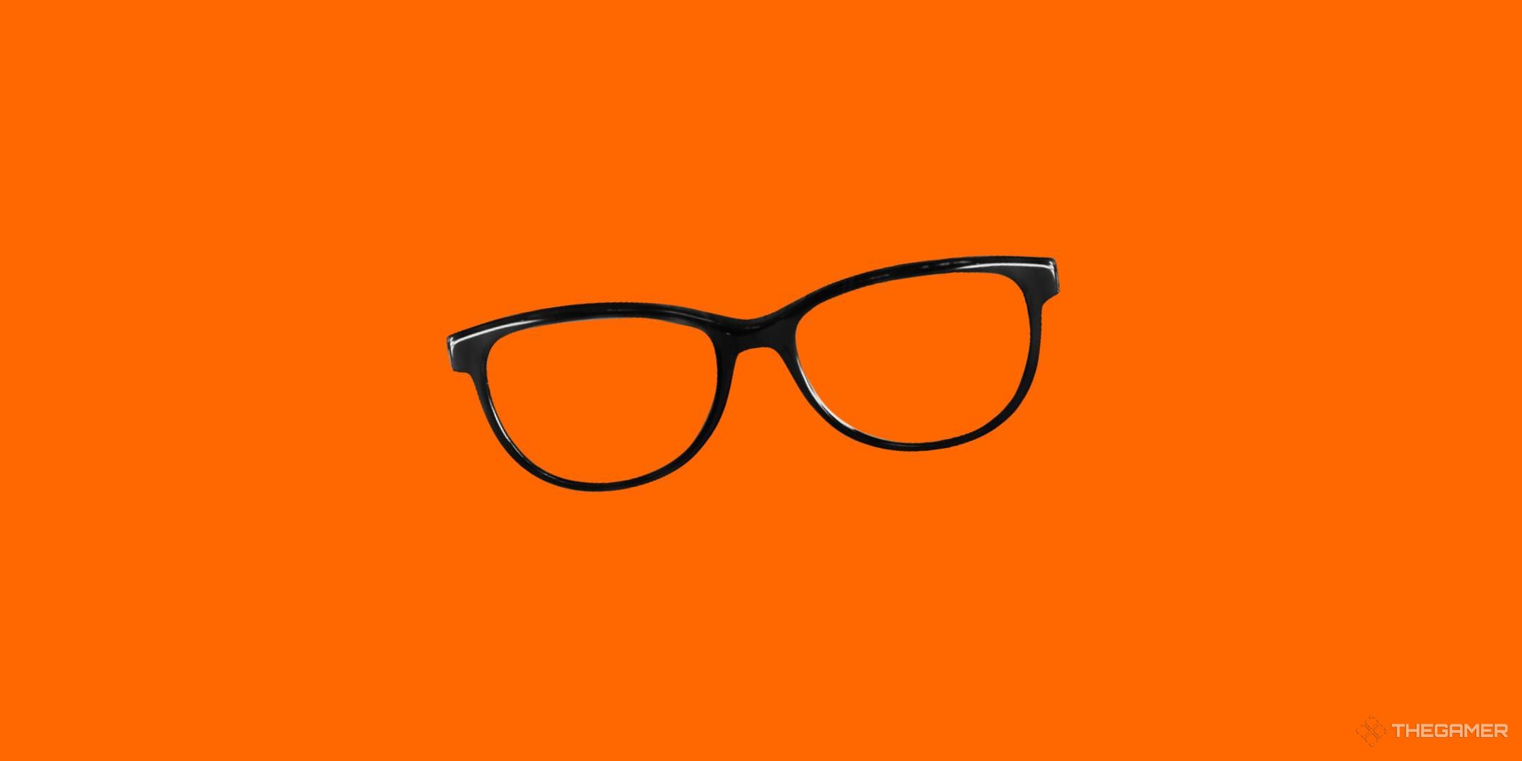 Black glasses on an orange background.
