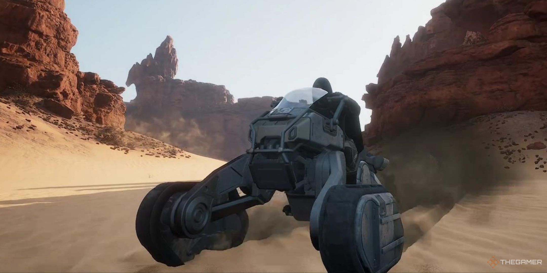 Mel'la Yel'la rides her sandbike directly at the camera in Dune Awakening.