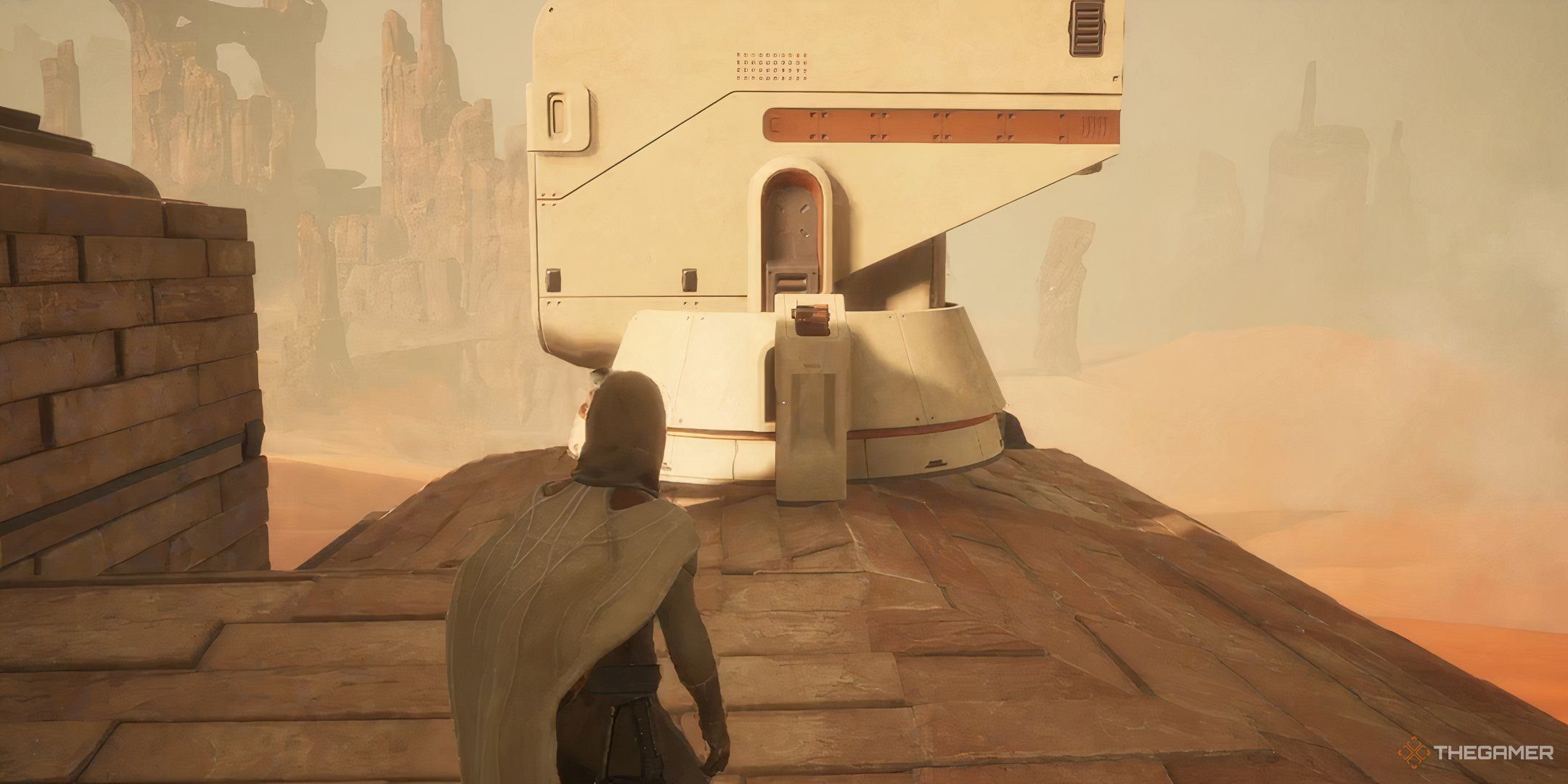 A player character in Dune: Awakening constructing a windtrap. 